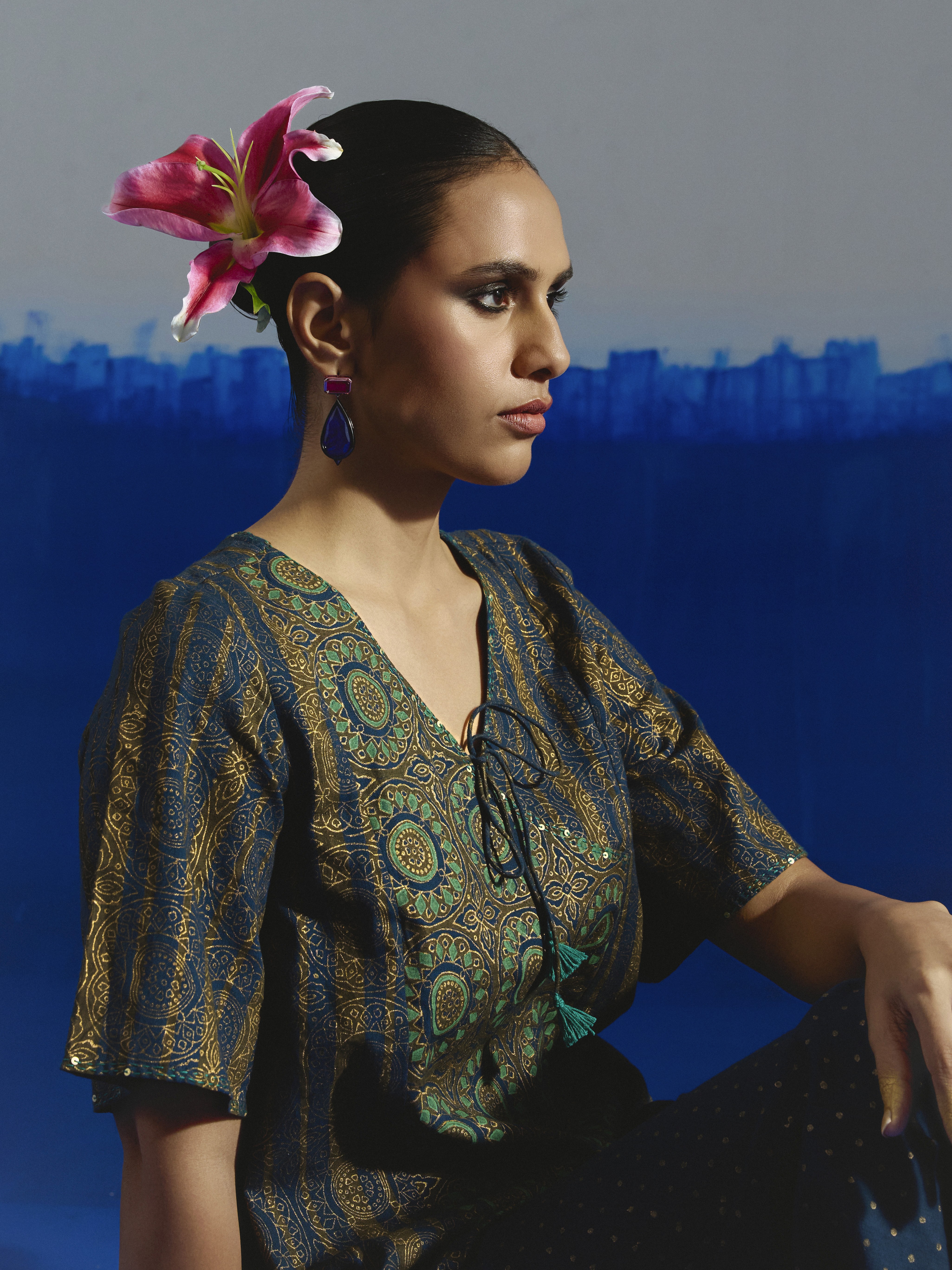 Friends laughing and posing inside a car