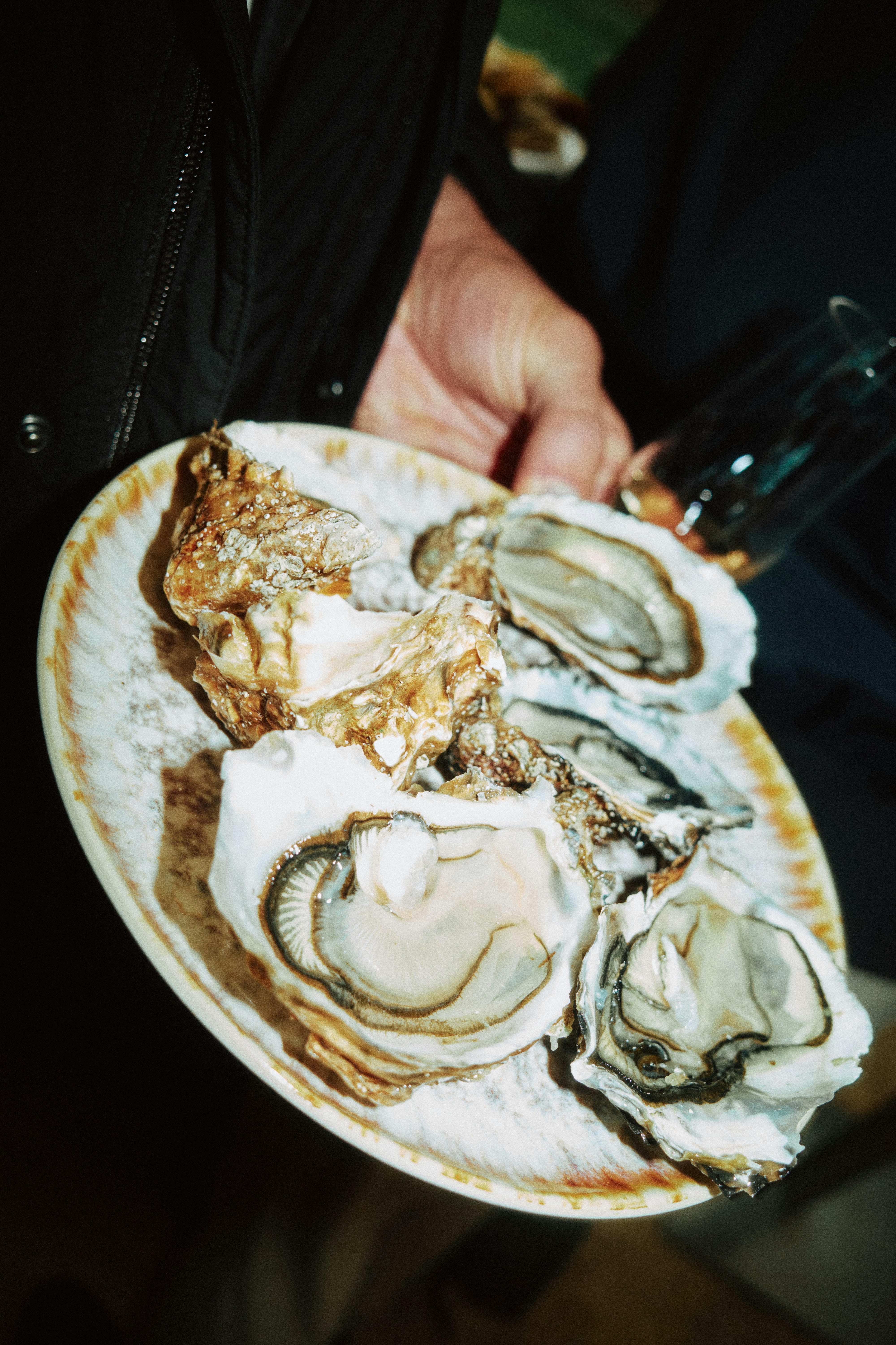 plate of fresh oysters being served