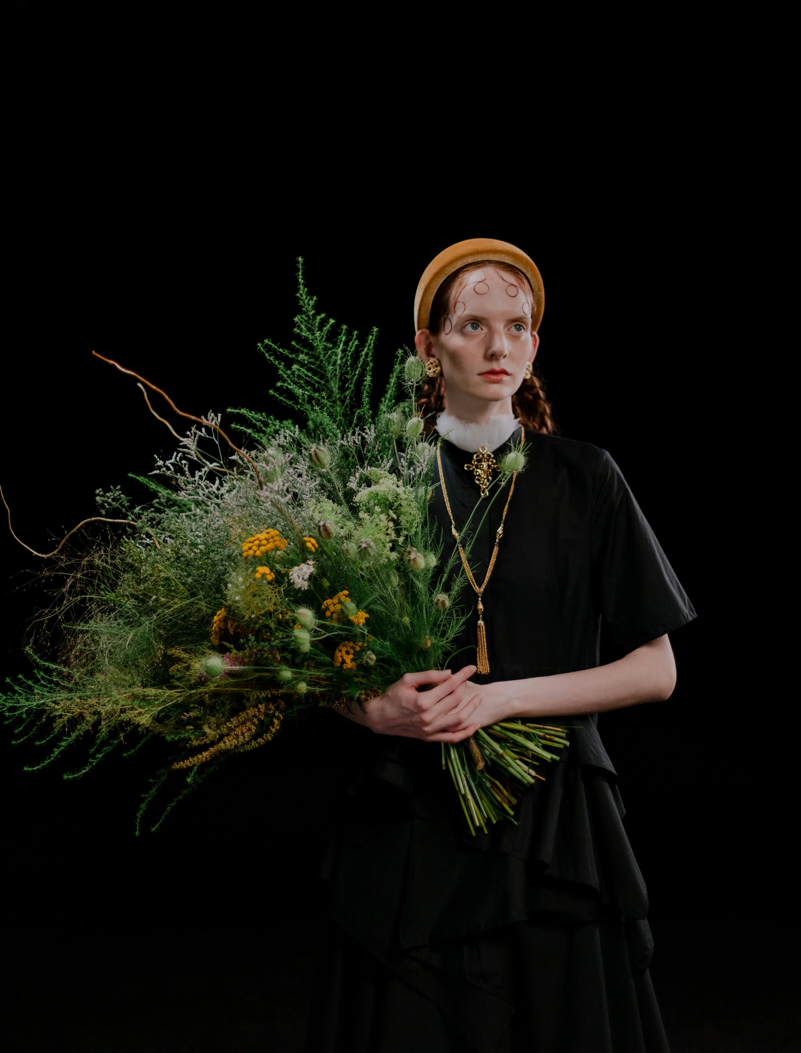 Victoria Hayes portrait with set of flowers