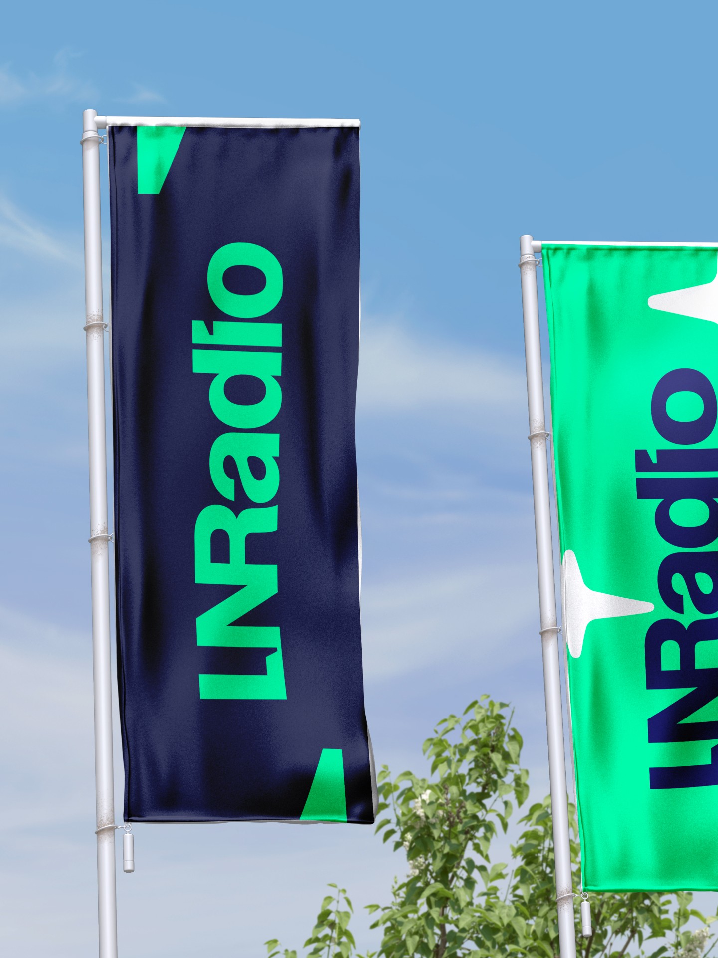 Modern home office setup with a monitor, ergonomic chair, keyboard, and indoor plants near a window with blinds.