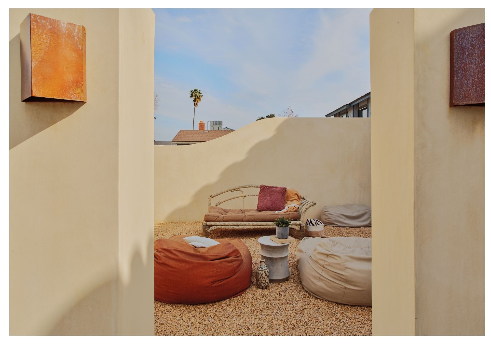 Young woman in casual clothing posing against a white background.