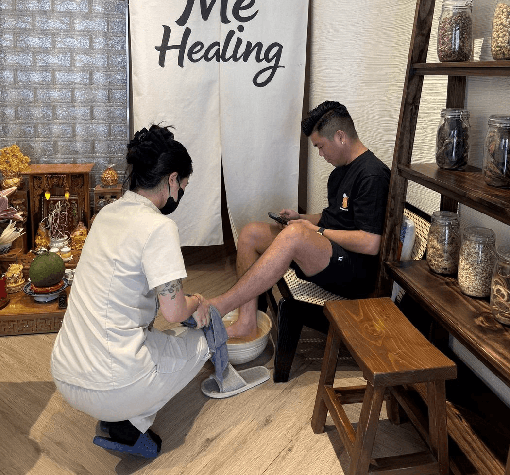 Fresh lemongrass and lime foot soak included in the 70 and 90 minute head spa at Mệ Healing