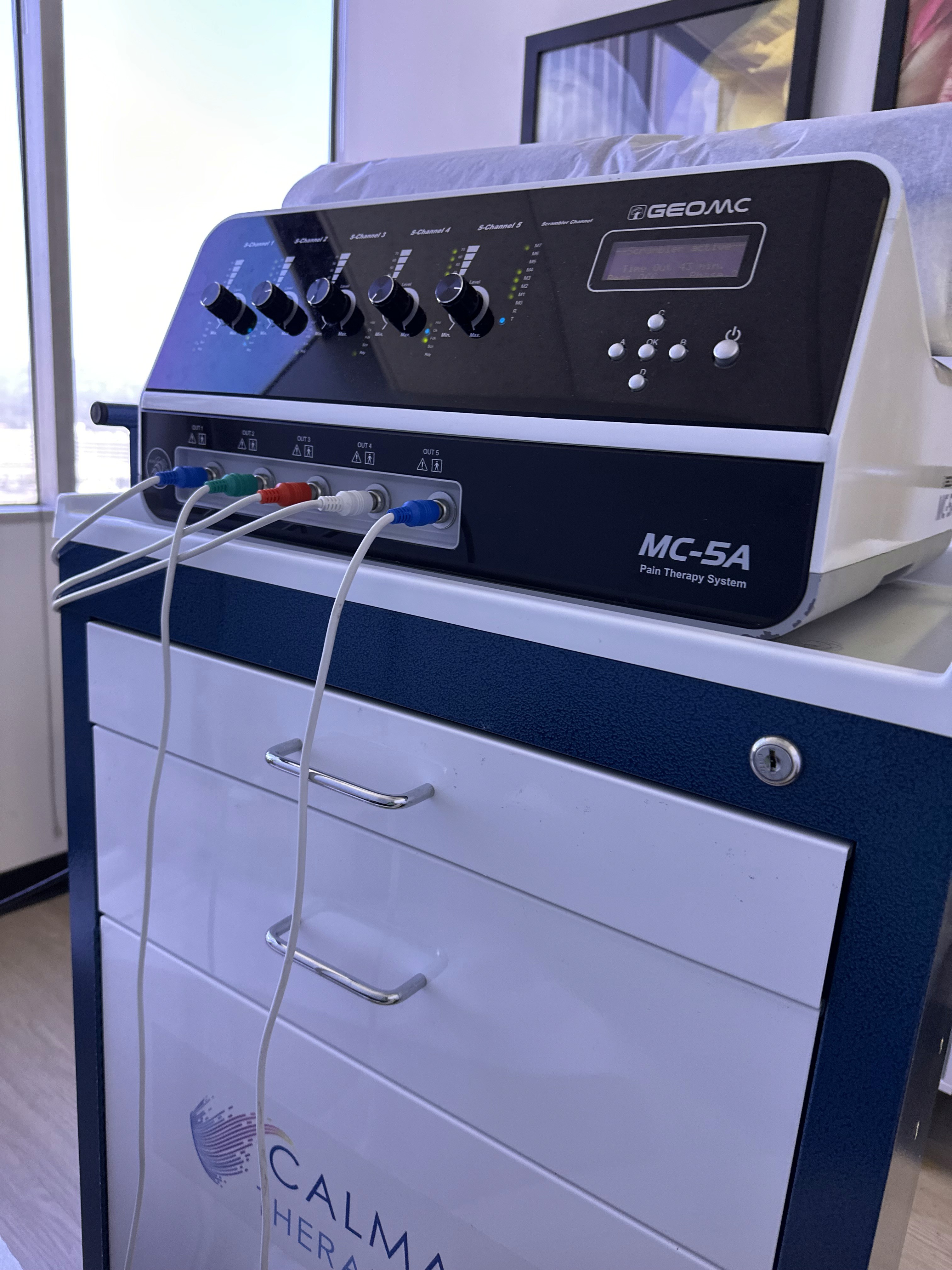 Image of a Calmare Scrambler Therapy device