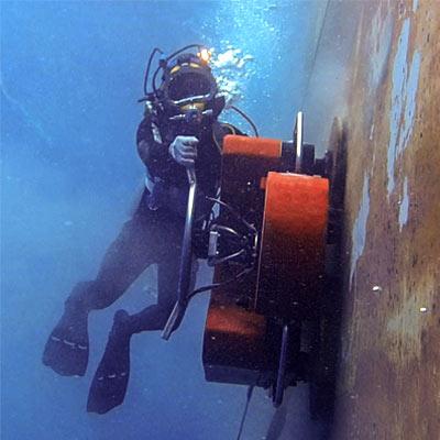 photography of two persons underwater