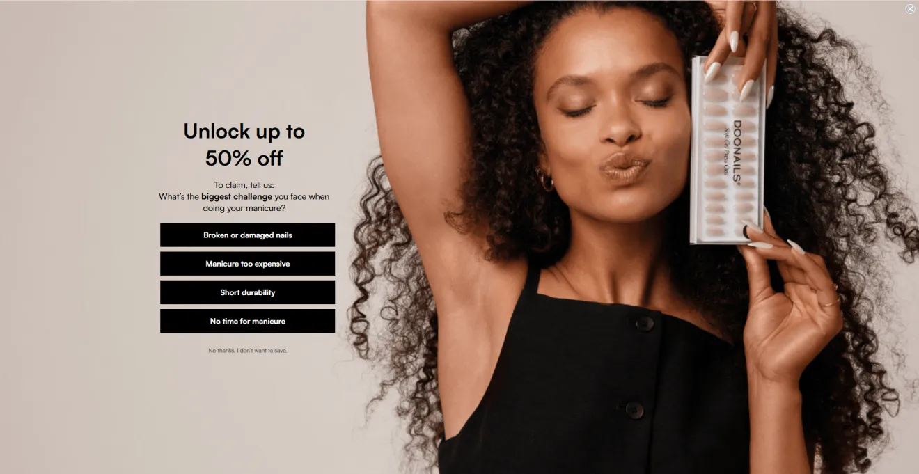 Alt text: Doonails welcome full-screen multi-step email popup featuring a quiz on the left asking users to choose their biggest manicure challenge to unlock up to 50% off