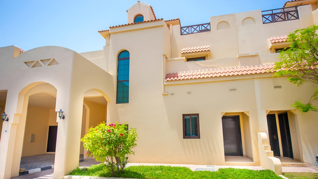 A beautiful house surrounded by well-maintained homes in a pleasant neighborhood in Al Qurm.