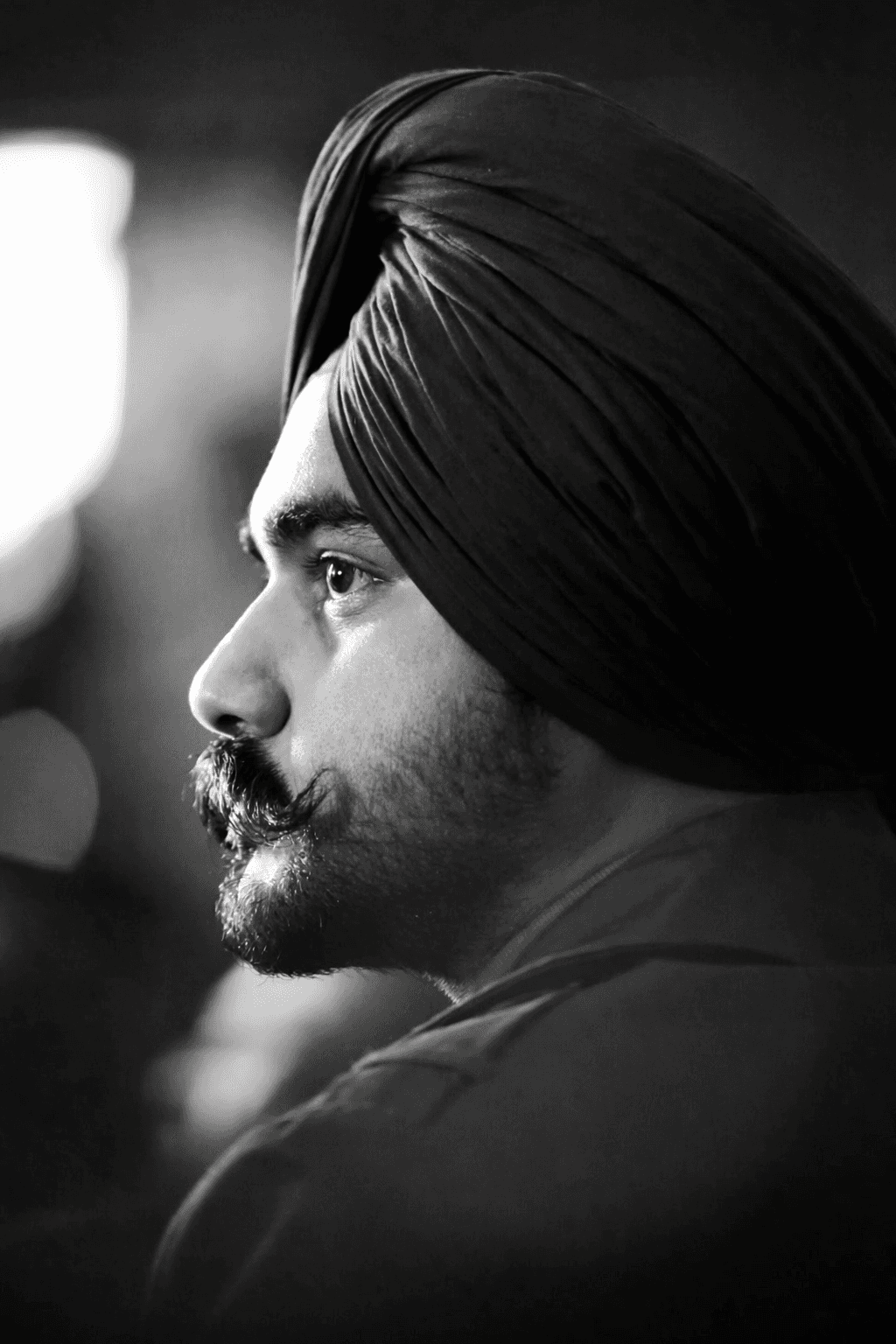 Music producer sitting in his studio