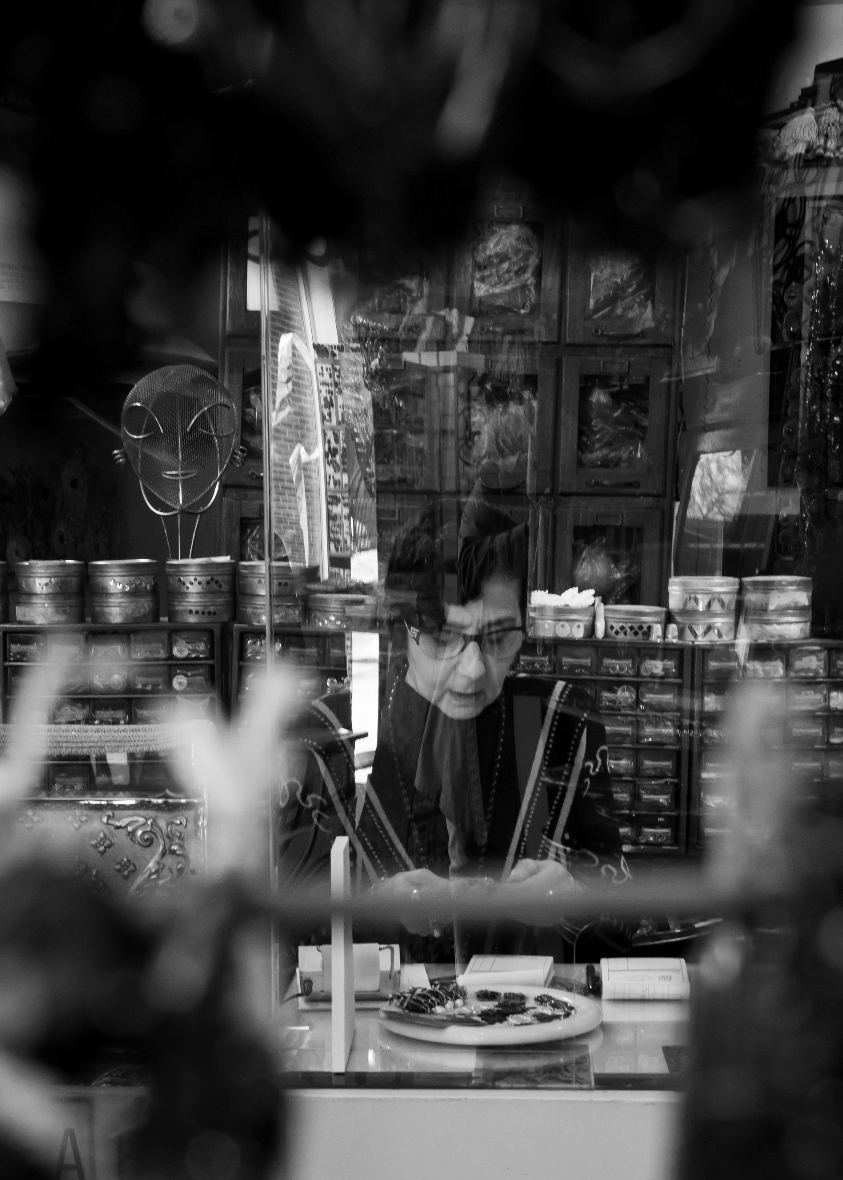 Woman at her counter store