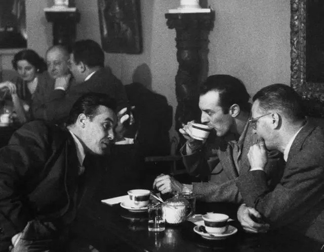 Men talking over coffee