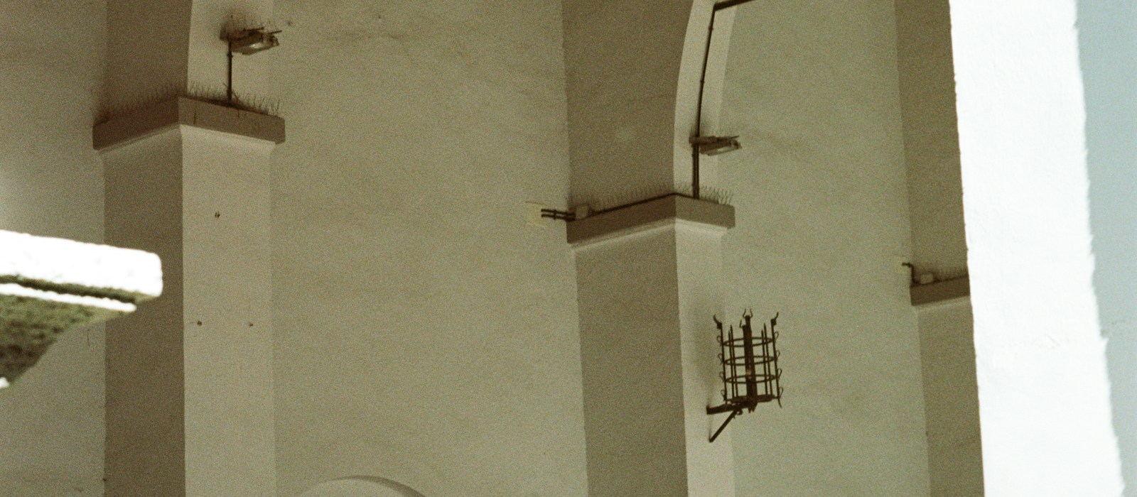Sunlit studio interior with warm plaster walls