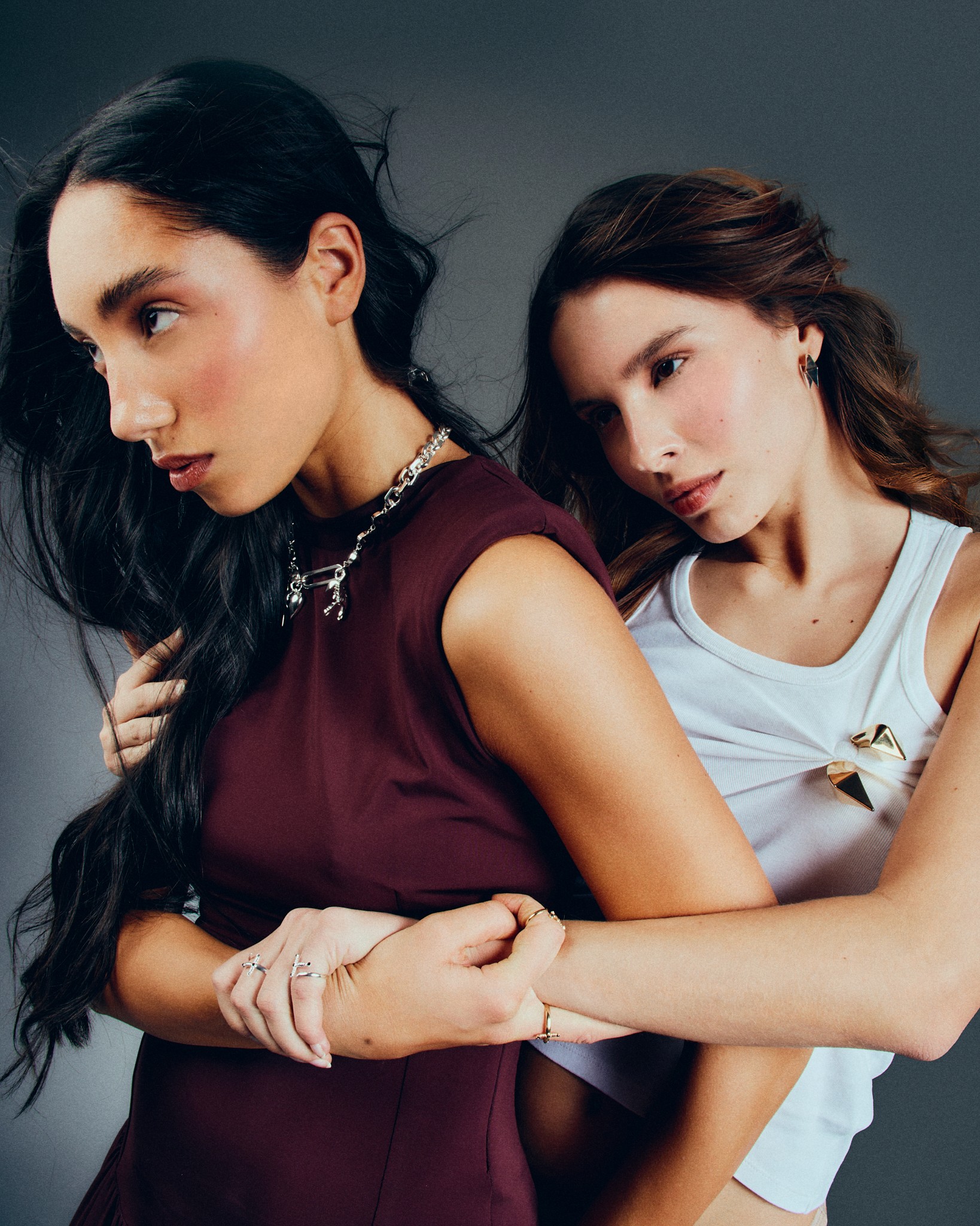 Girl riding a skateboard while sitting