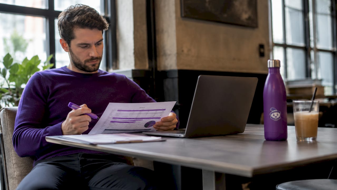 Person reviewing SEO rank tracking reports
