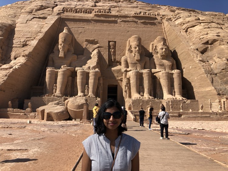 Anika Jain in front of the Great Temple at Abu Simbel, Egypt 