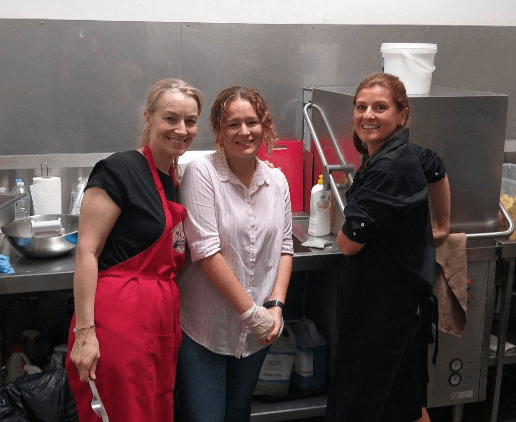 Club volunteers assisting at the North Geelong Warriors canteen on matchday.