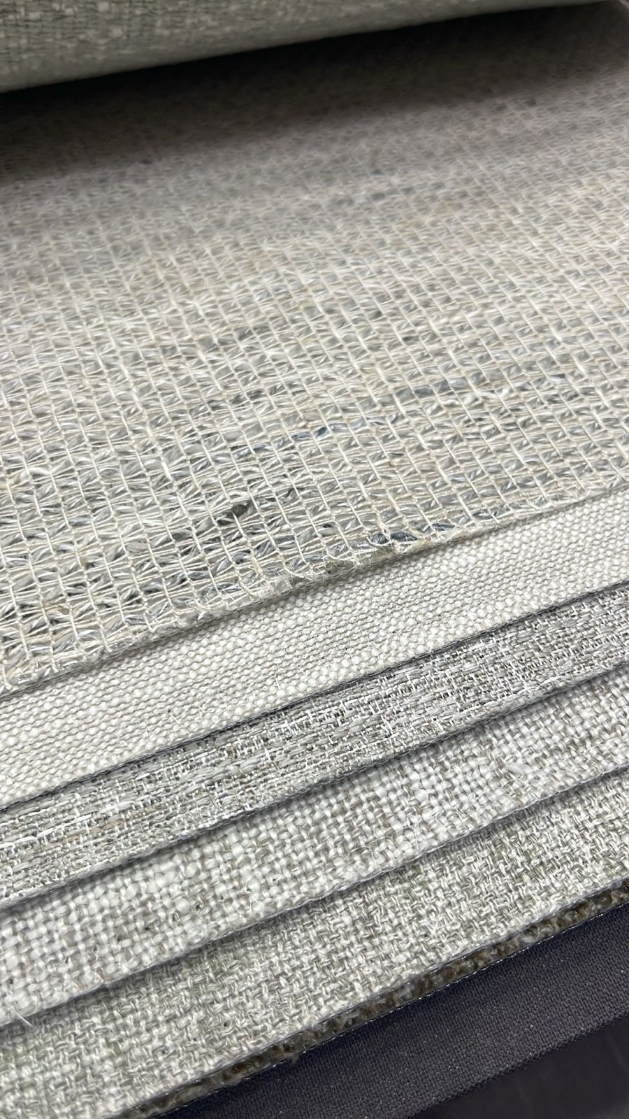 an abstract painting of a brown and black swirl