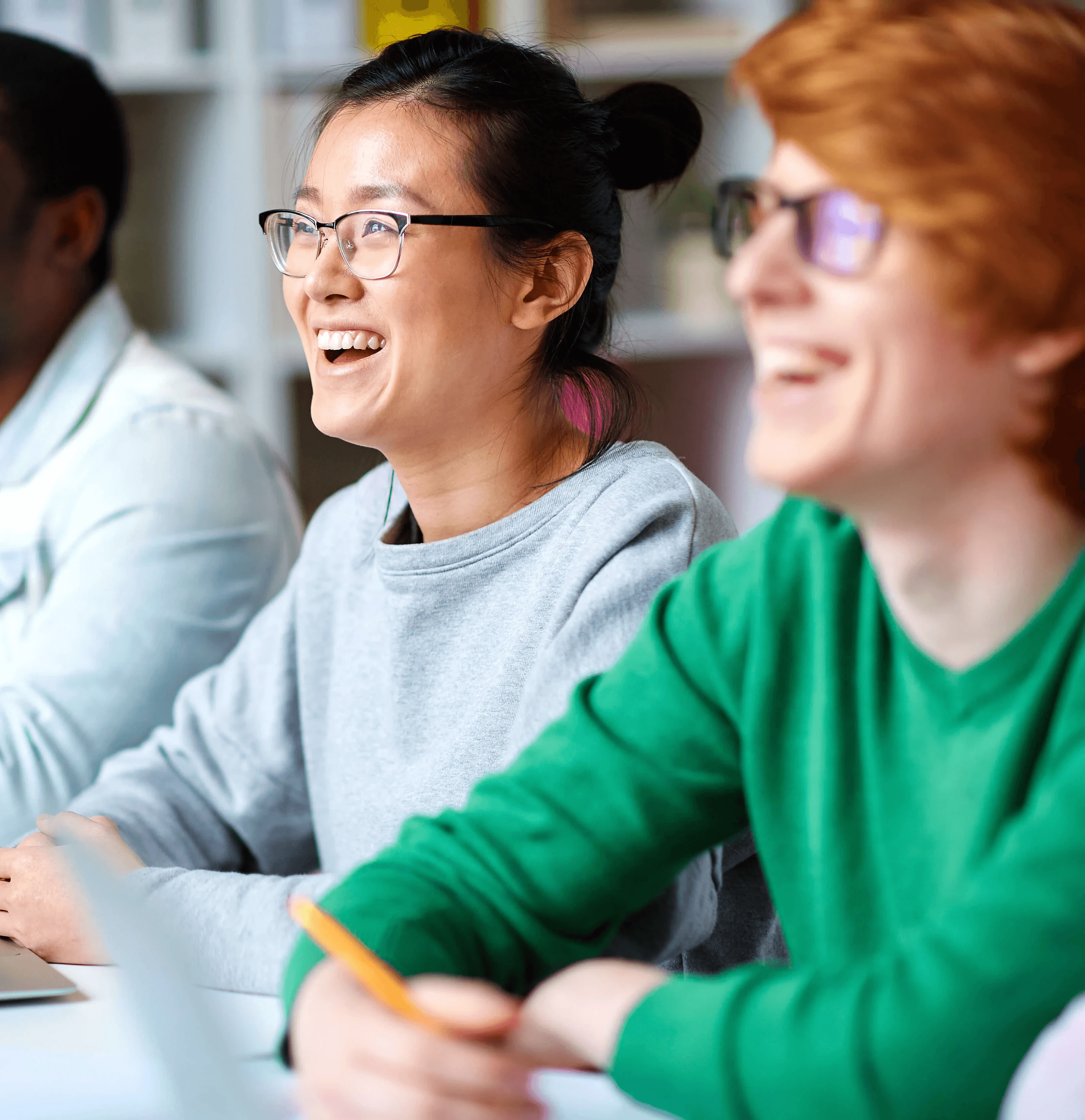 A vintage school bus is driving down the road