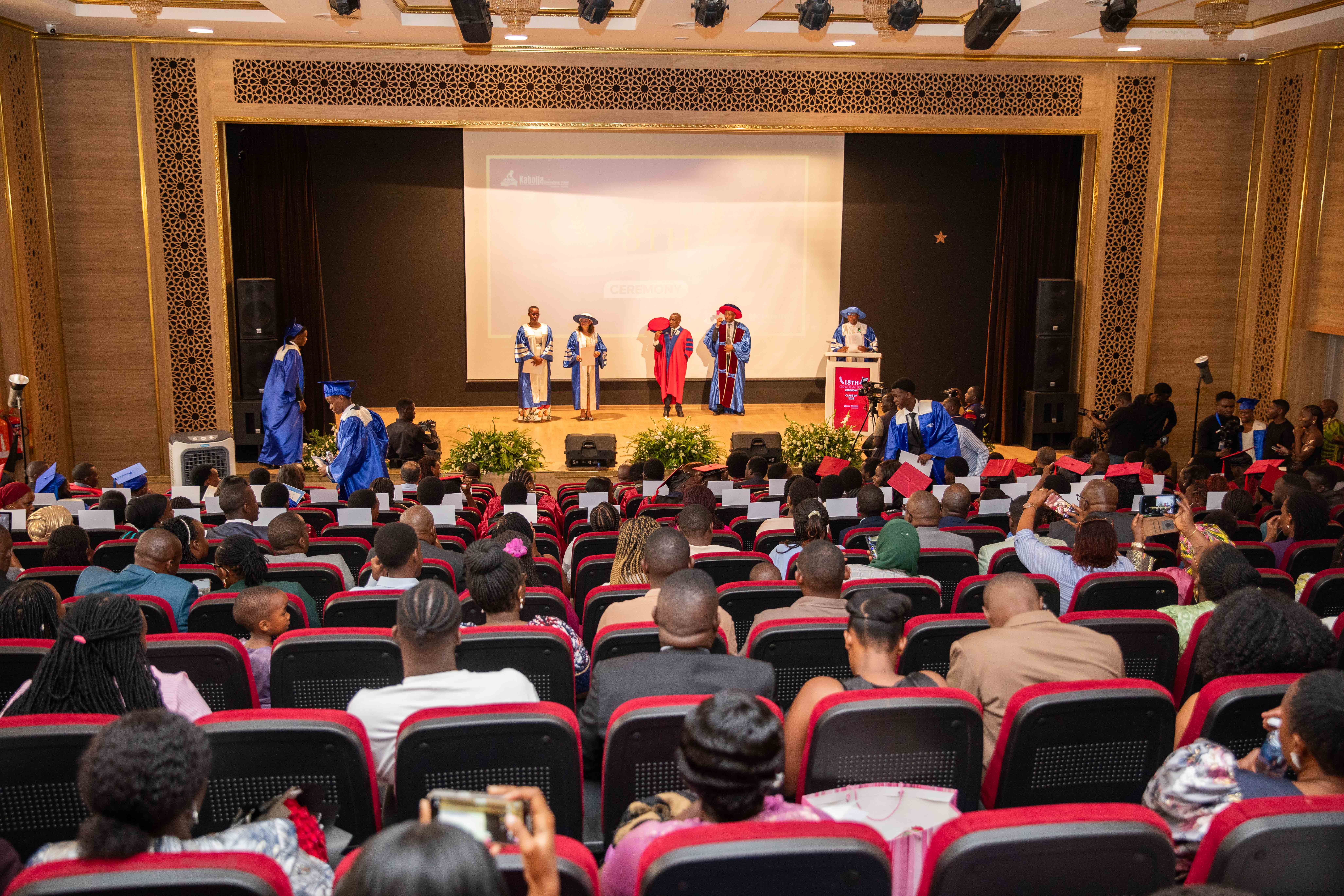 A schoolgirl participates in an online lesson using a tablet