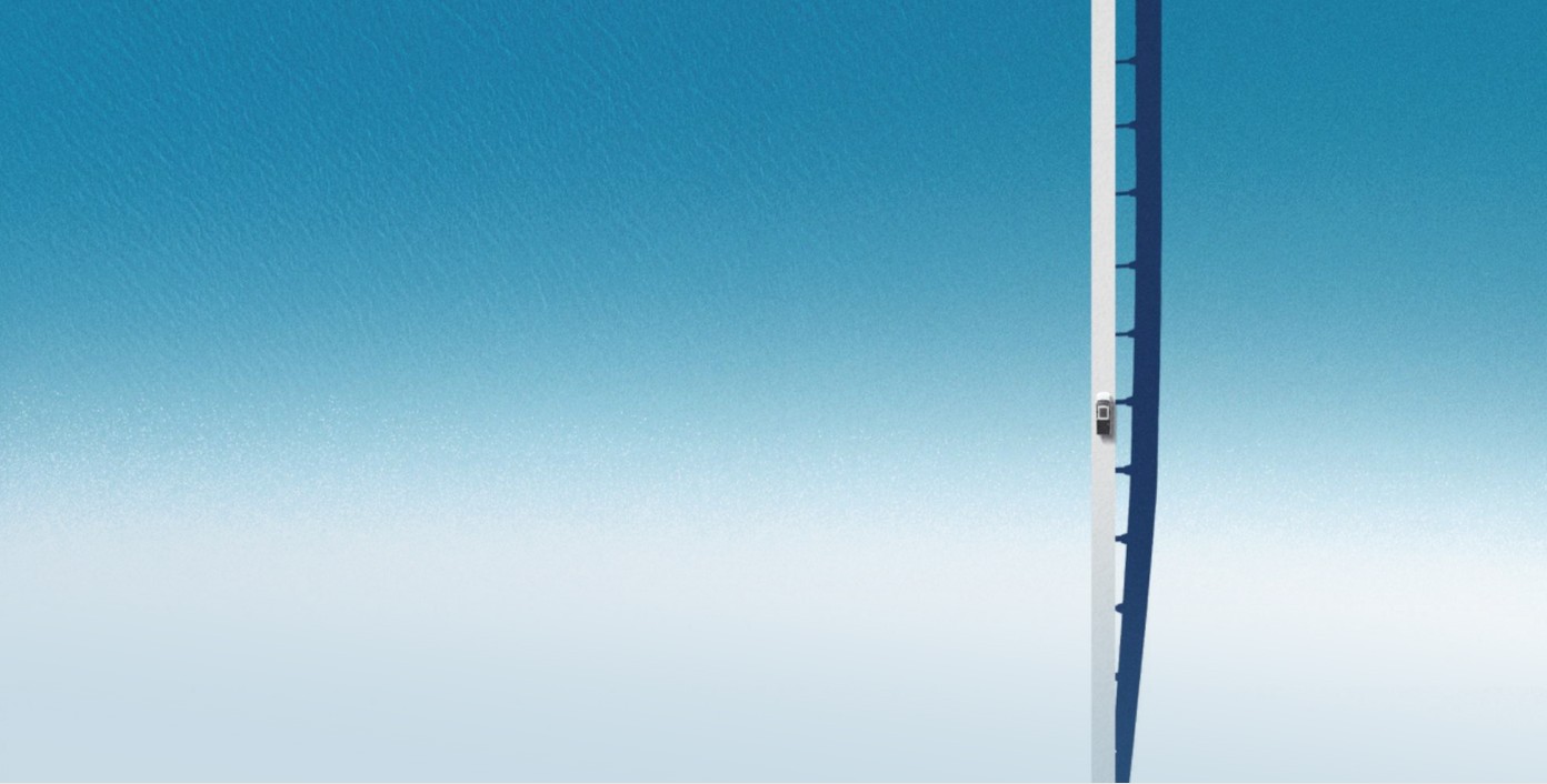 Long vertical road stretching into a blue sky gradient.