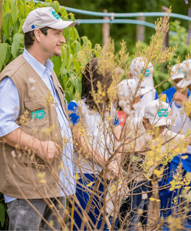 woman in white dress sitting on swing