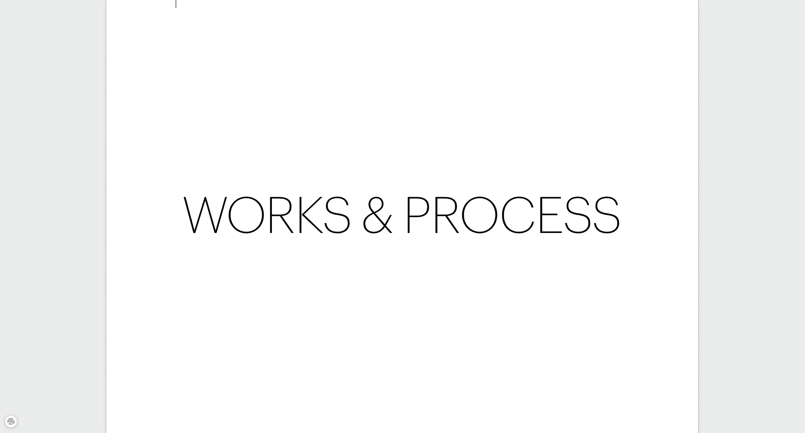 a woman with dreadlocks standing in front of a wall