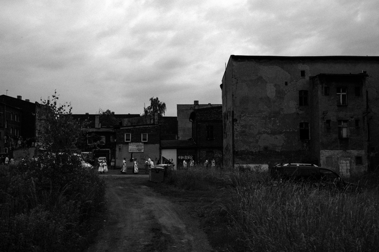 Perspective view of a road in Silesia, monochrome documentary style.