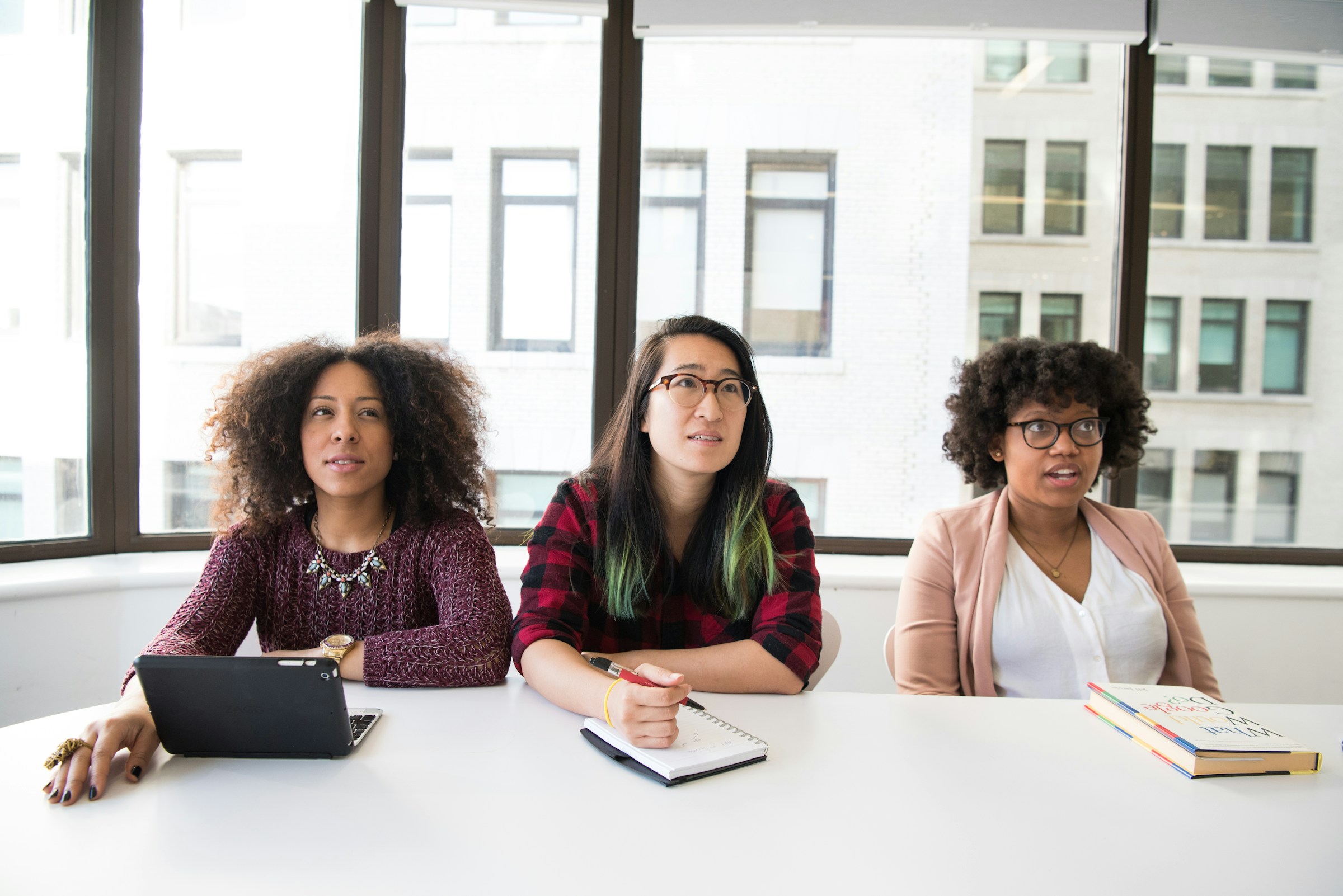 person sitting on desk - How to Cite an Article 