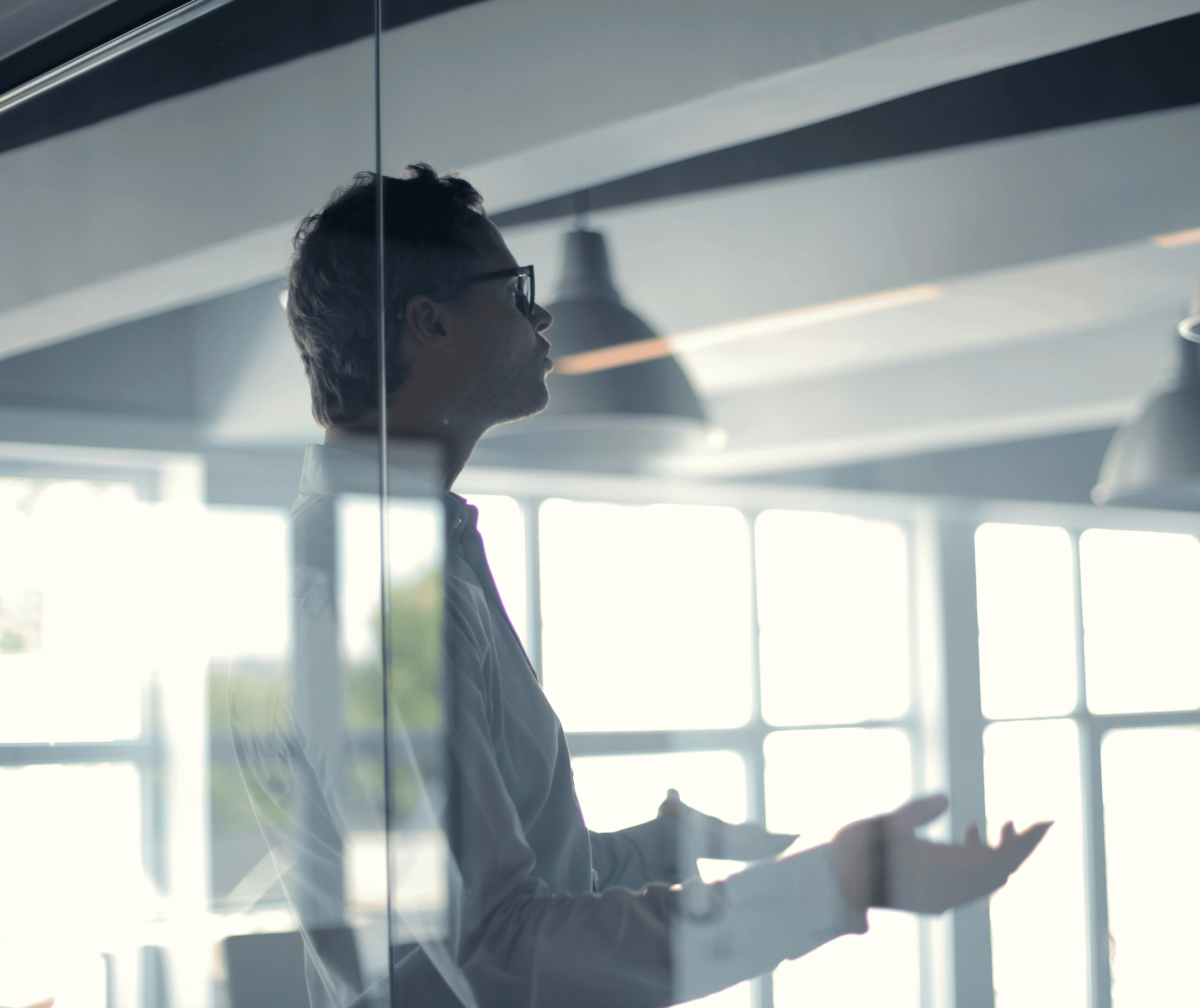 person sitting in a chair in front of a man