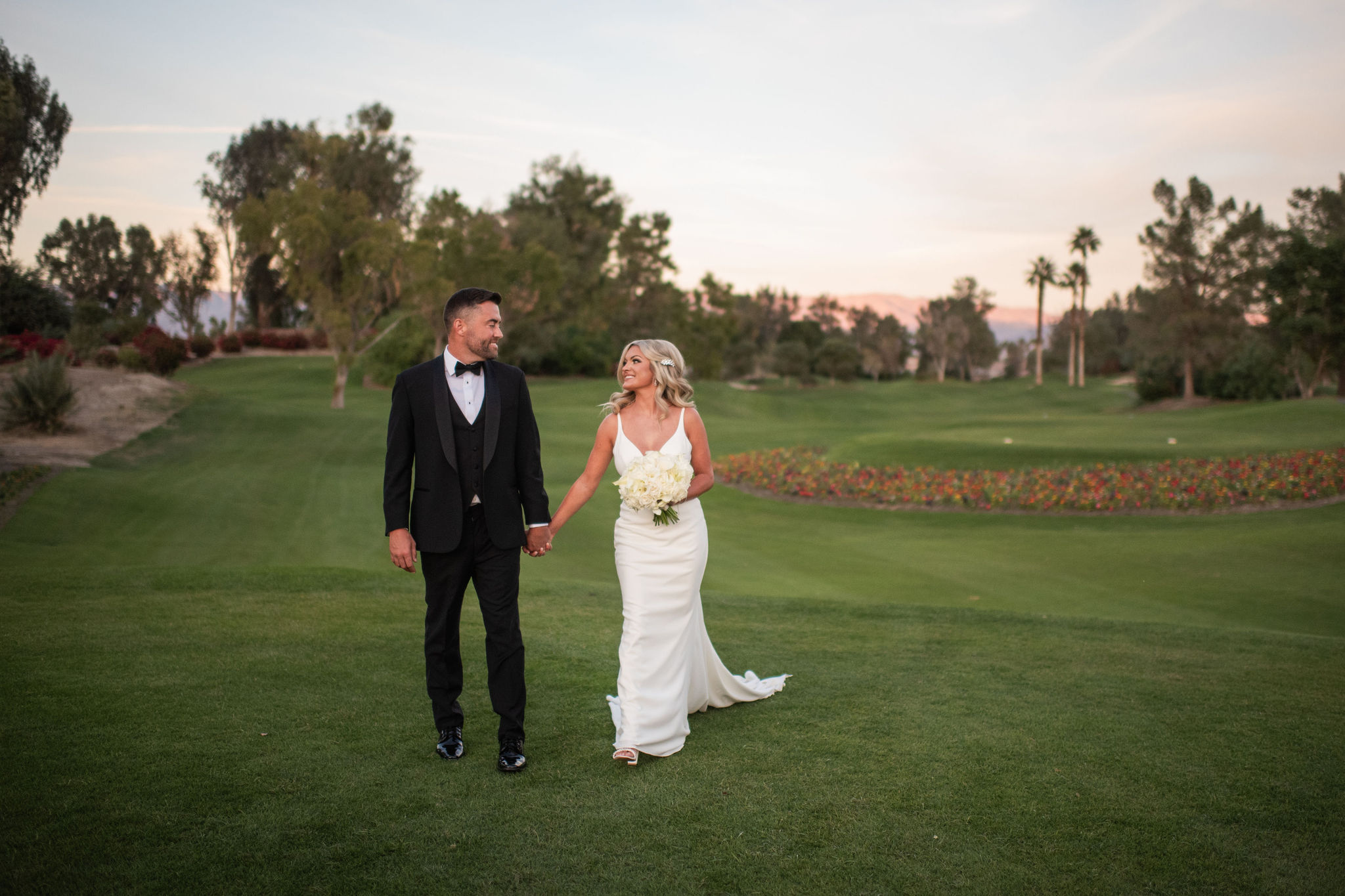 Shiba Inu dog jumping to catch falling autumn leaves