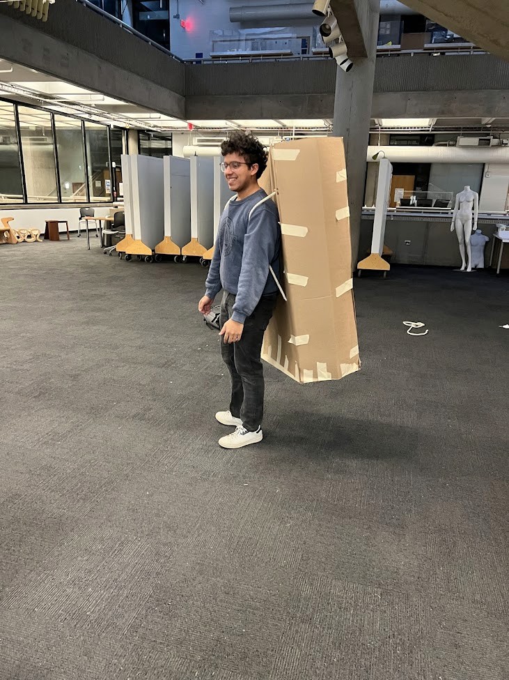 Vintage office with a typewriter, wooden desk, and green leather chair.