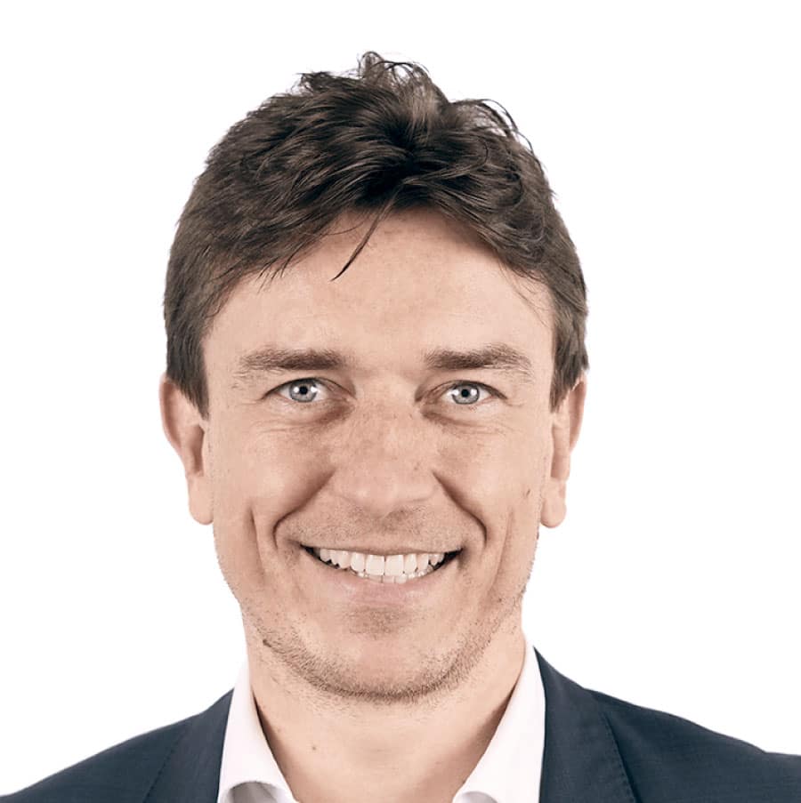 woman holding heft long blonde hair