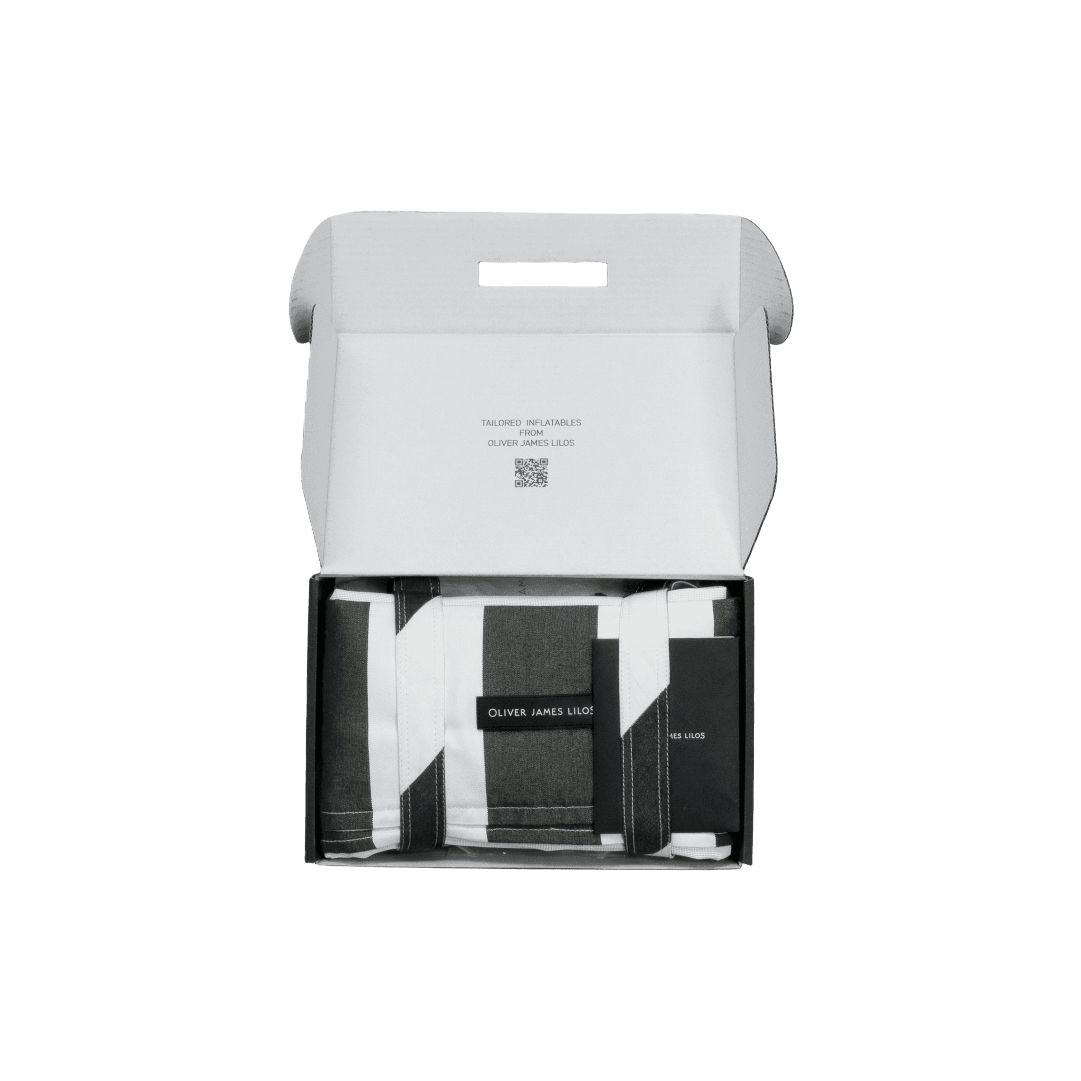 Black-and-white striped lilo folded in its structured black travel case with branded label and securing straps