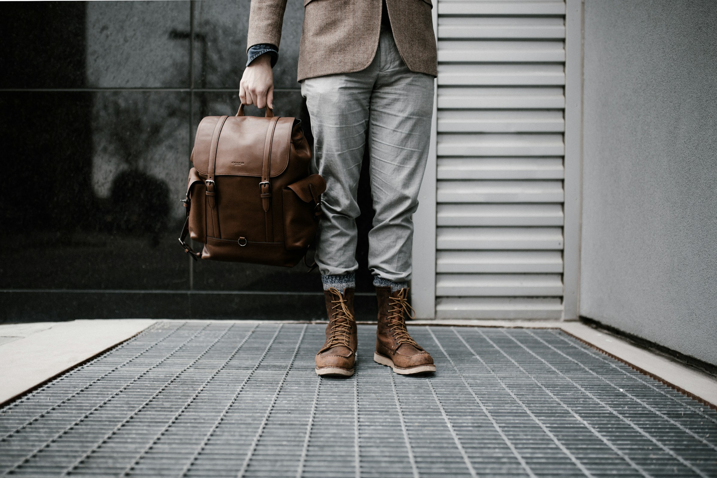 Person Holding Brown Bag - Colors That Go with Brown Clothes