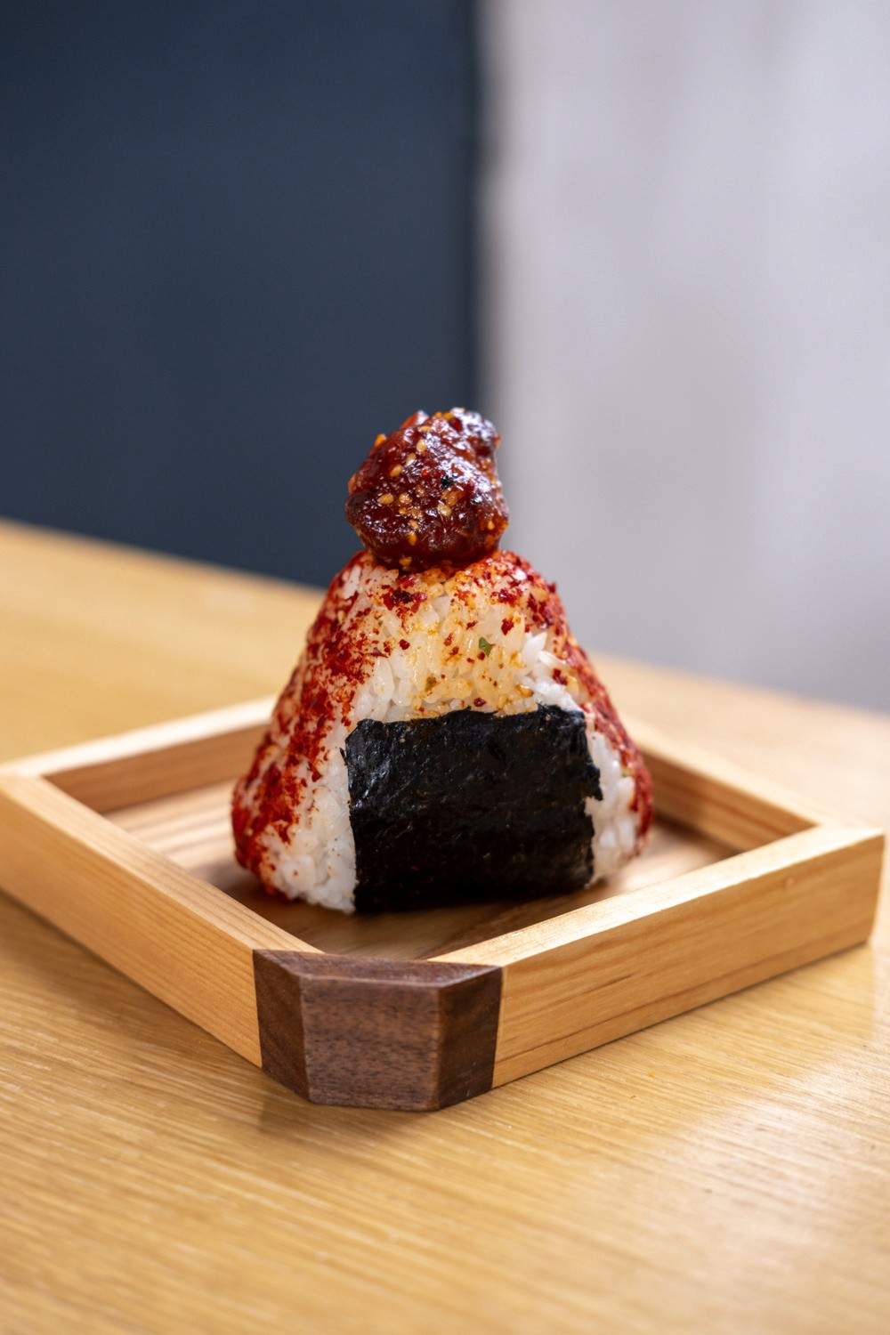 Bottles of olive standing on the marble counter