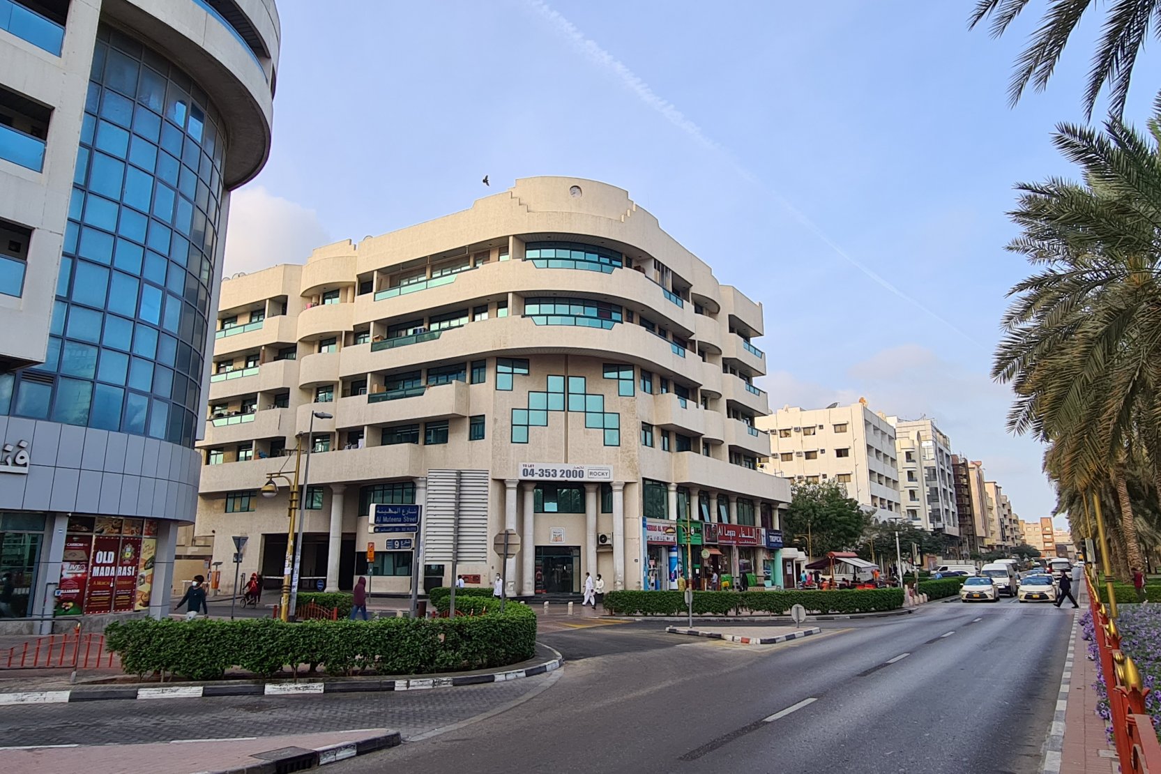 Modern apartment building in Muteena Dubai. Contact our real estate agent for expert property investment advice.