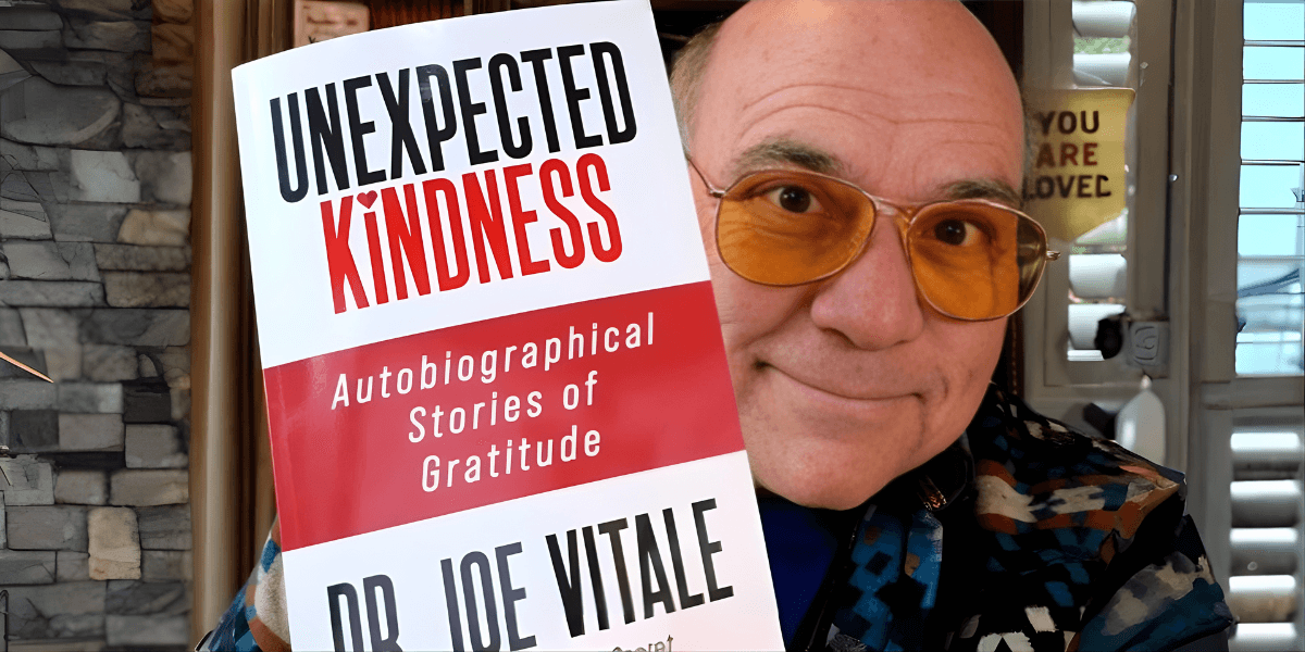 Dr. Joe Vitale holding his book Unexpected Kindness, co-producing The Kindness Documentary to inspire global healing through kindness