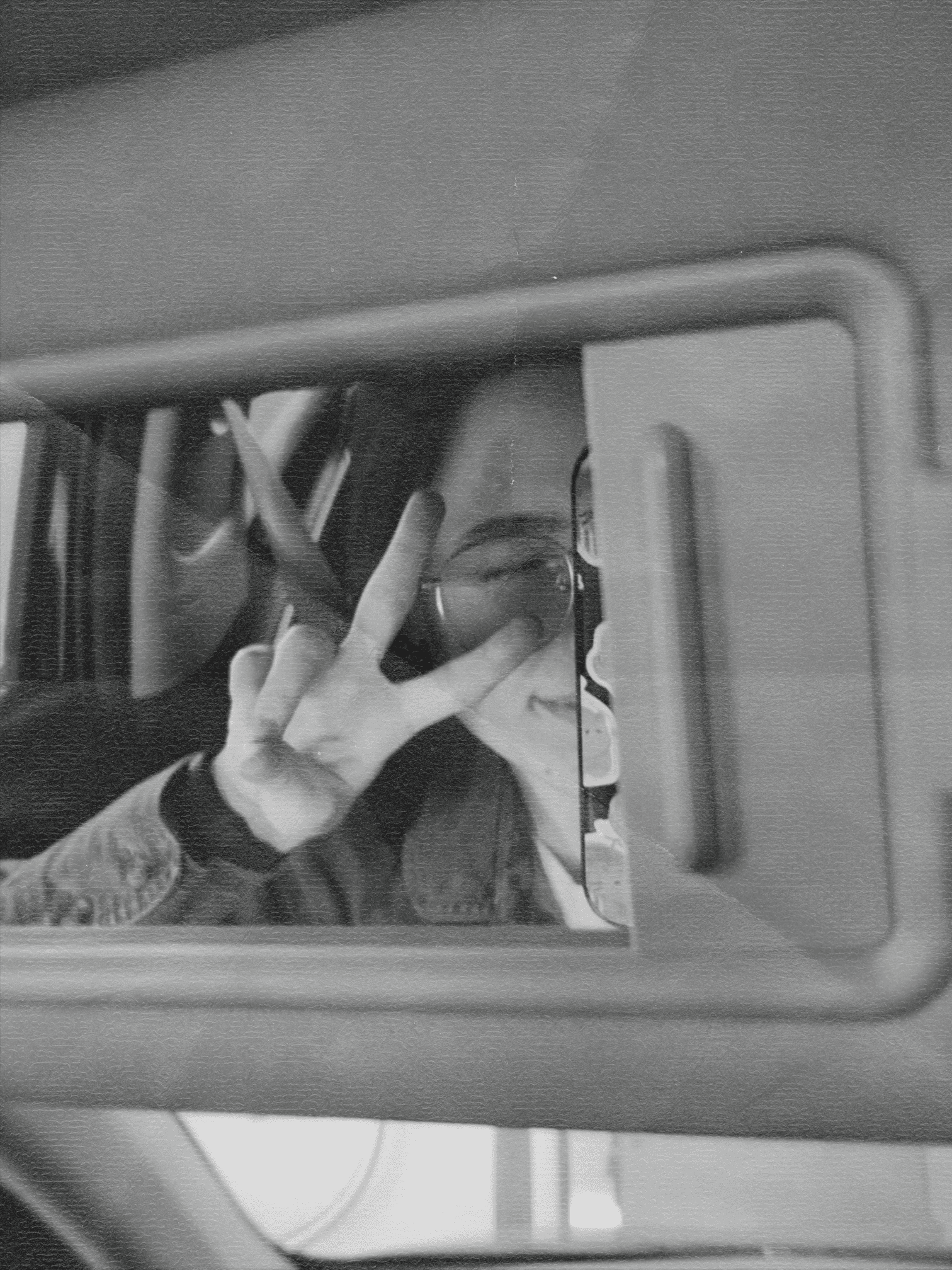 a blurry photo of a person standing in front of a wall