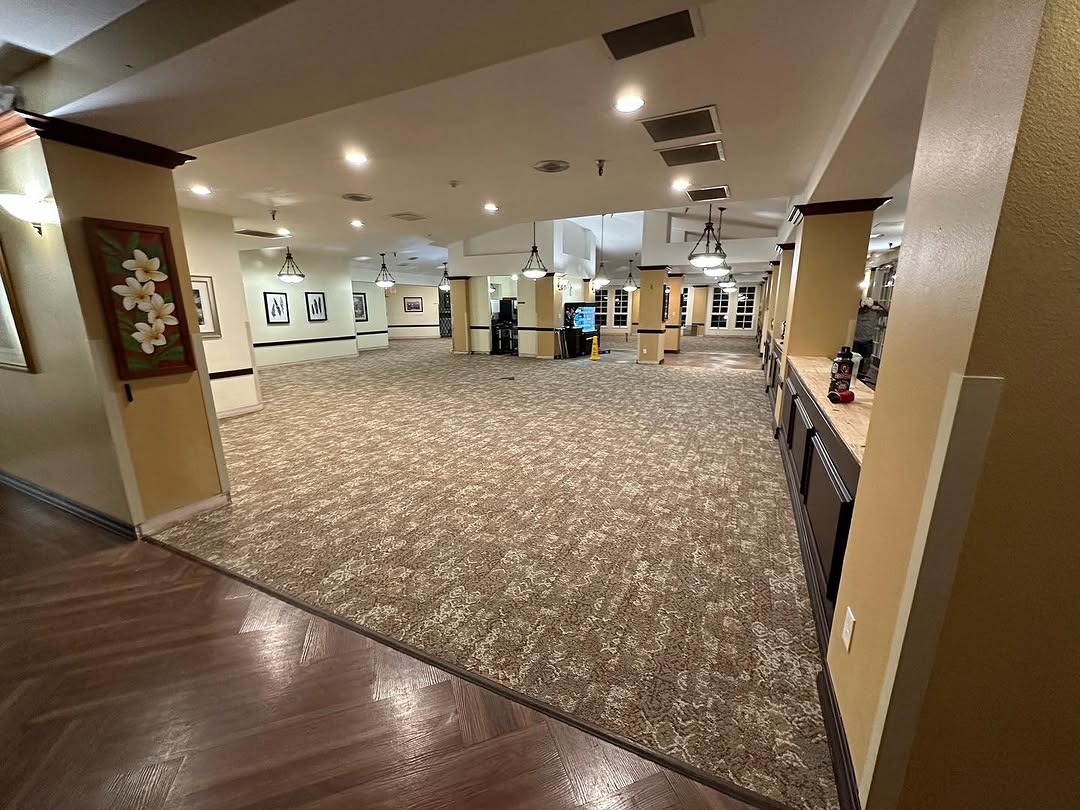Completed dining hall recarpet seen from the entry
