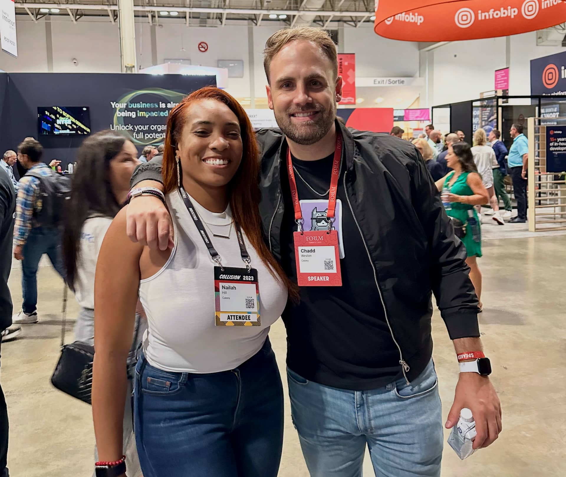 Designer Chadd Weston posing with Calaxy lead UX researcher, Nailah Hill at Web Summit conference in Toronto, Canada