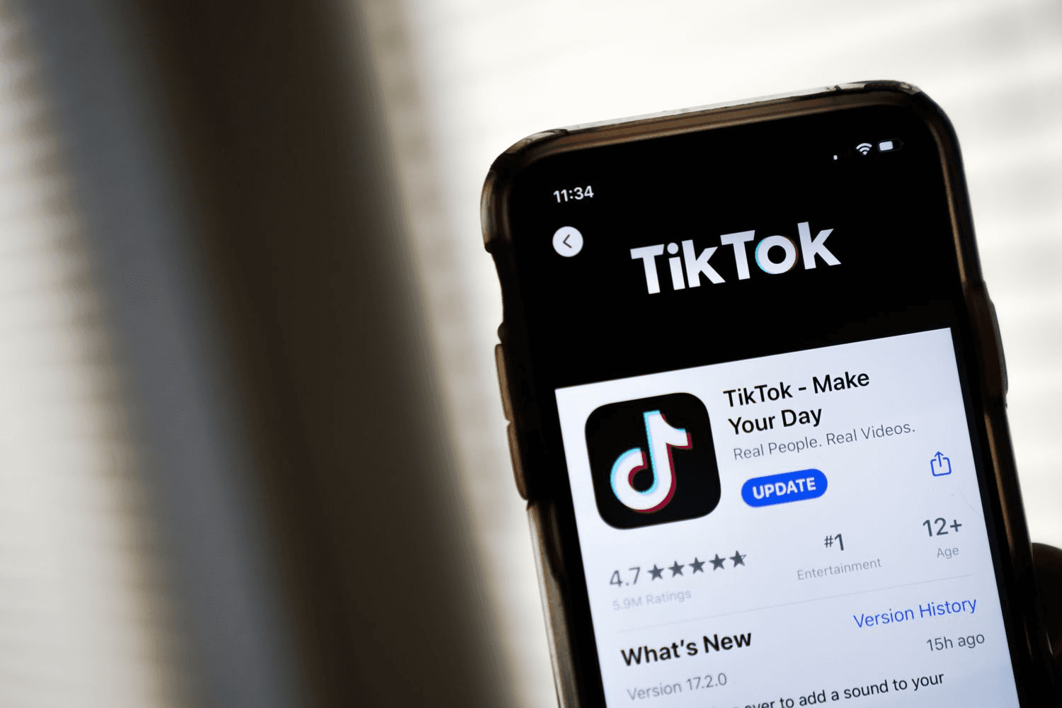 TikTok app store page displayed - Why Is My Content Under Review on TikTok