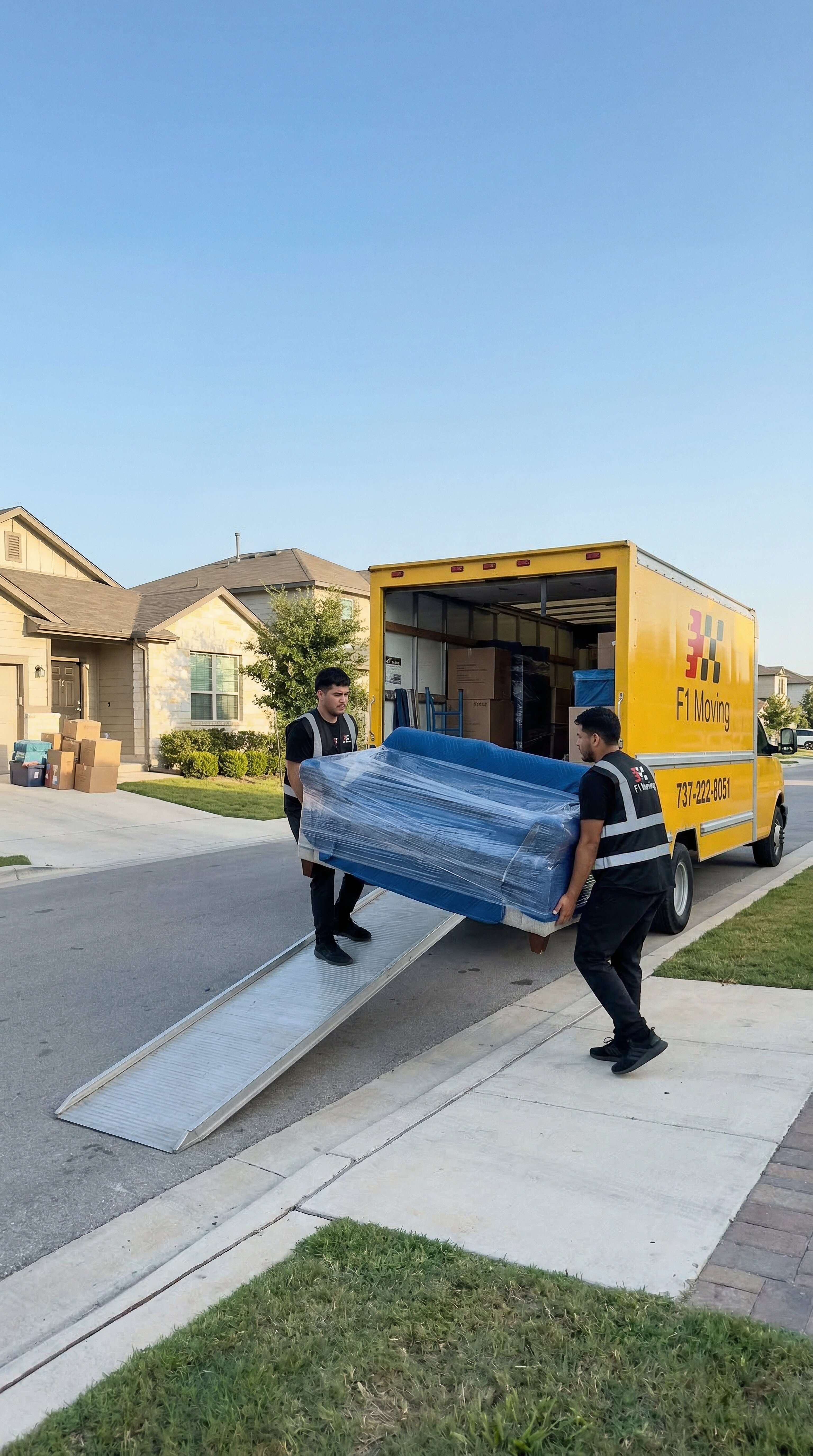 professional moving company in Austin TX loading furniture safely into truck