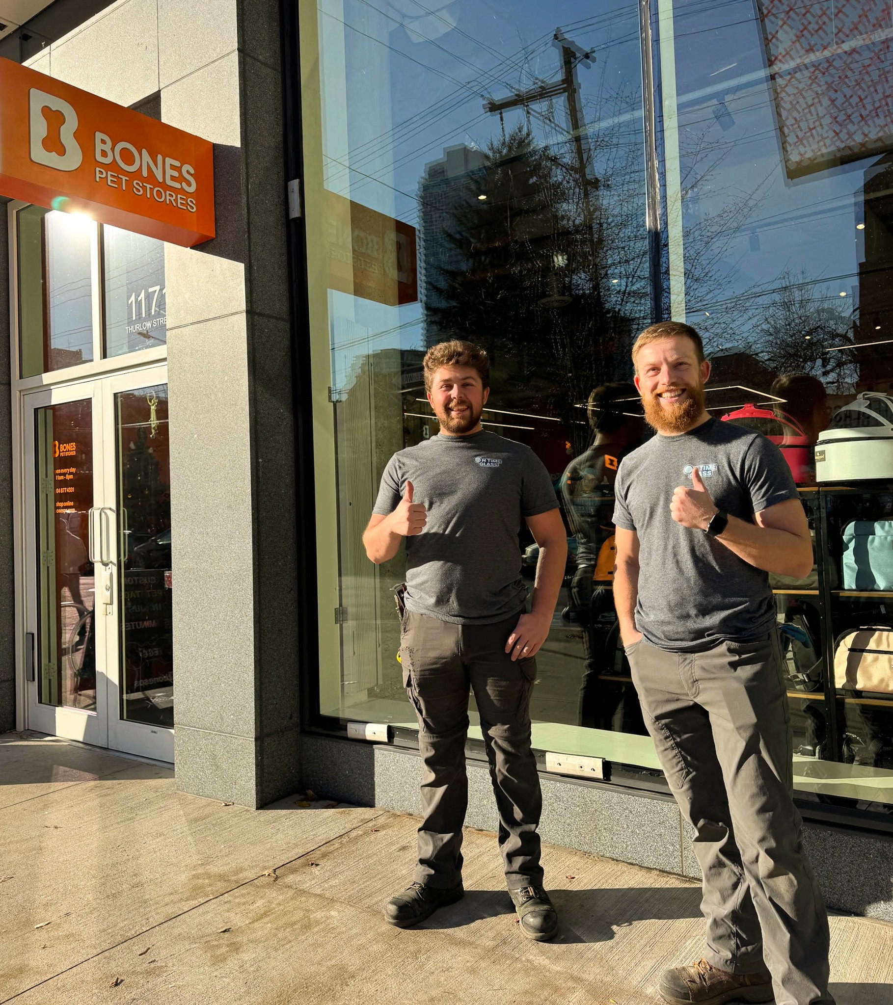 On Time Glass Team Members Outside of completed glass repair