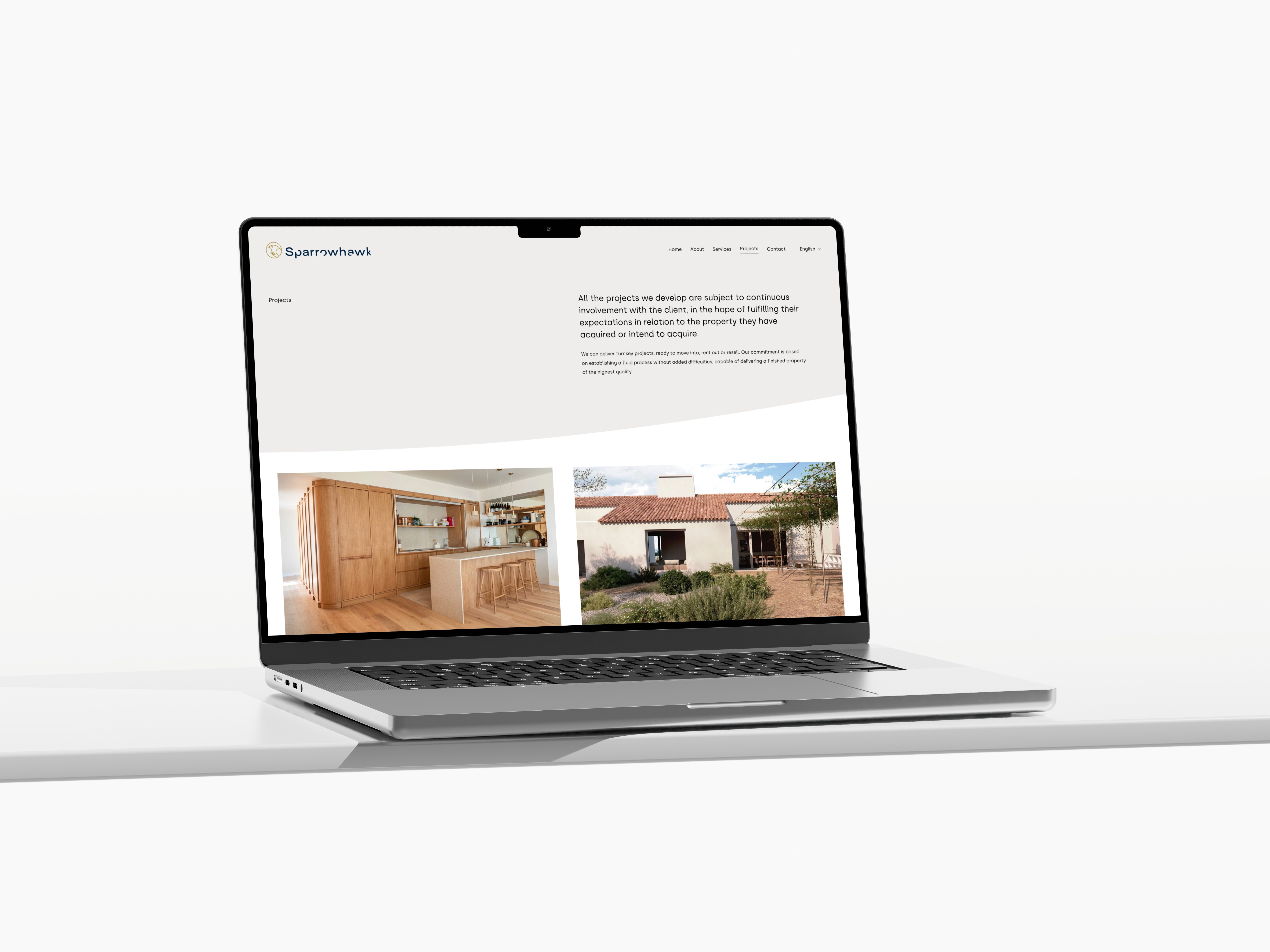 an image showing the website on an macbook of a construction and real estate management company