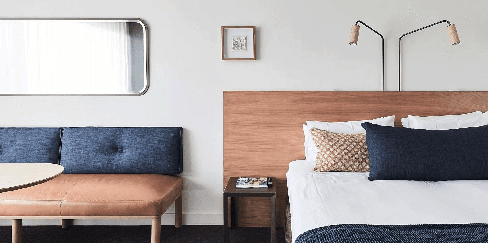 brown wooden chairs and table near glass window