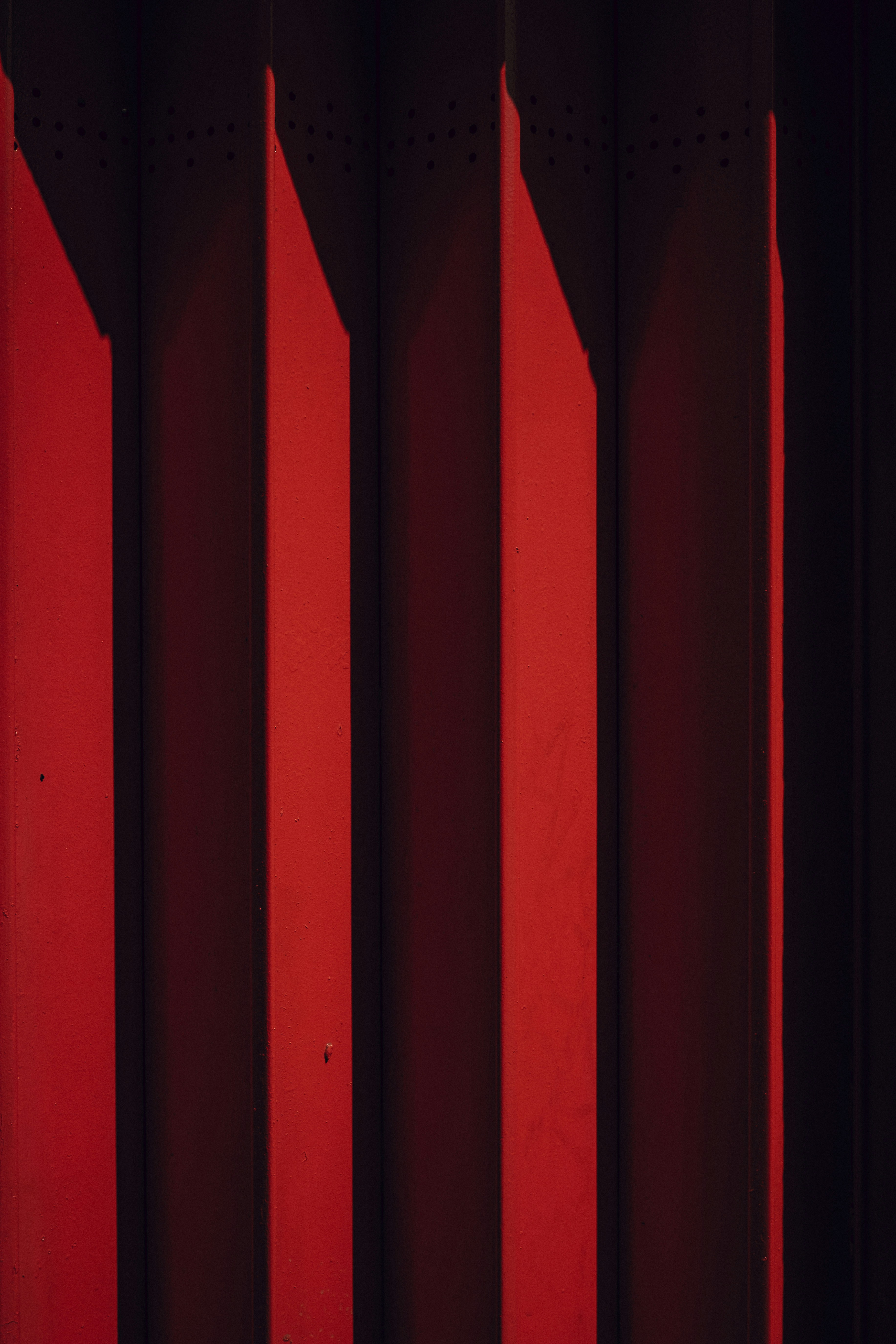 photo of a red wall using shadows