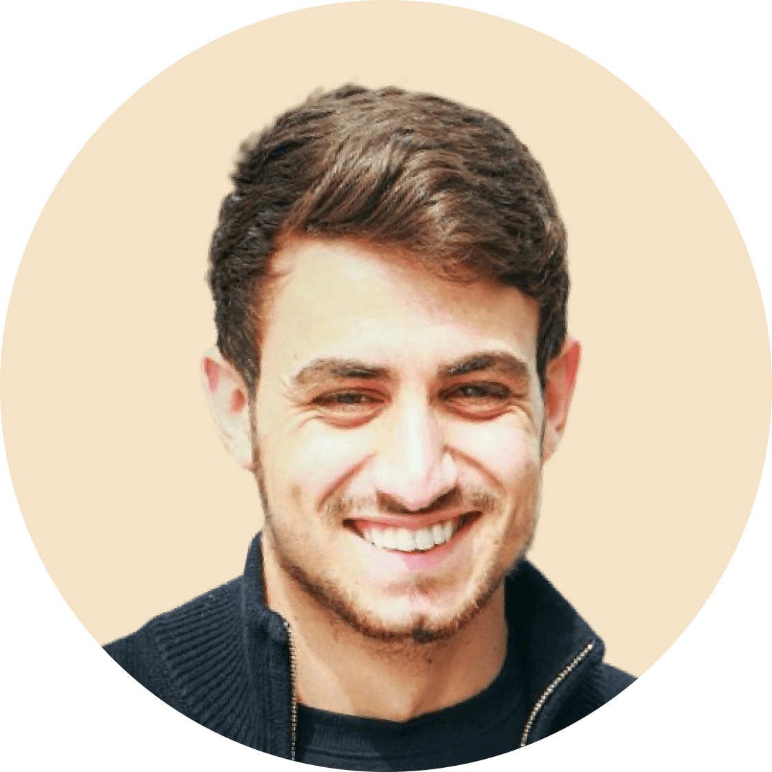 A portrait of a young man smiling