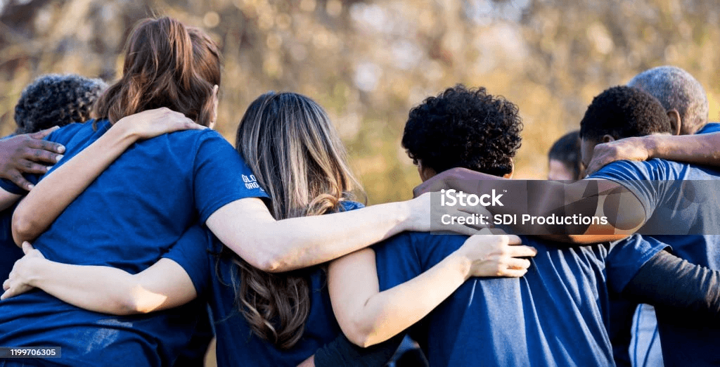 lurred crowd of people walking through a busy airport or transit terminal.