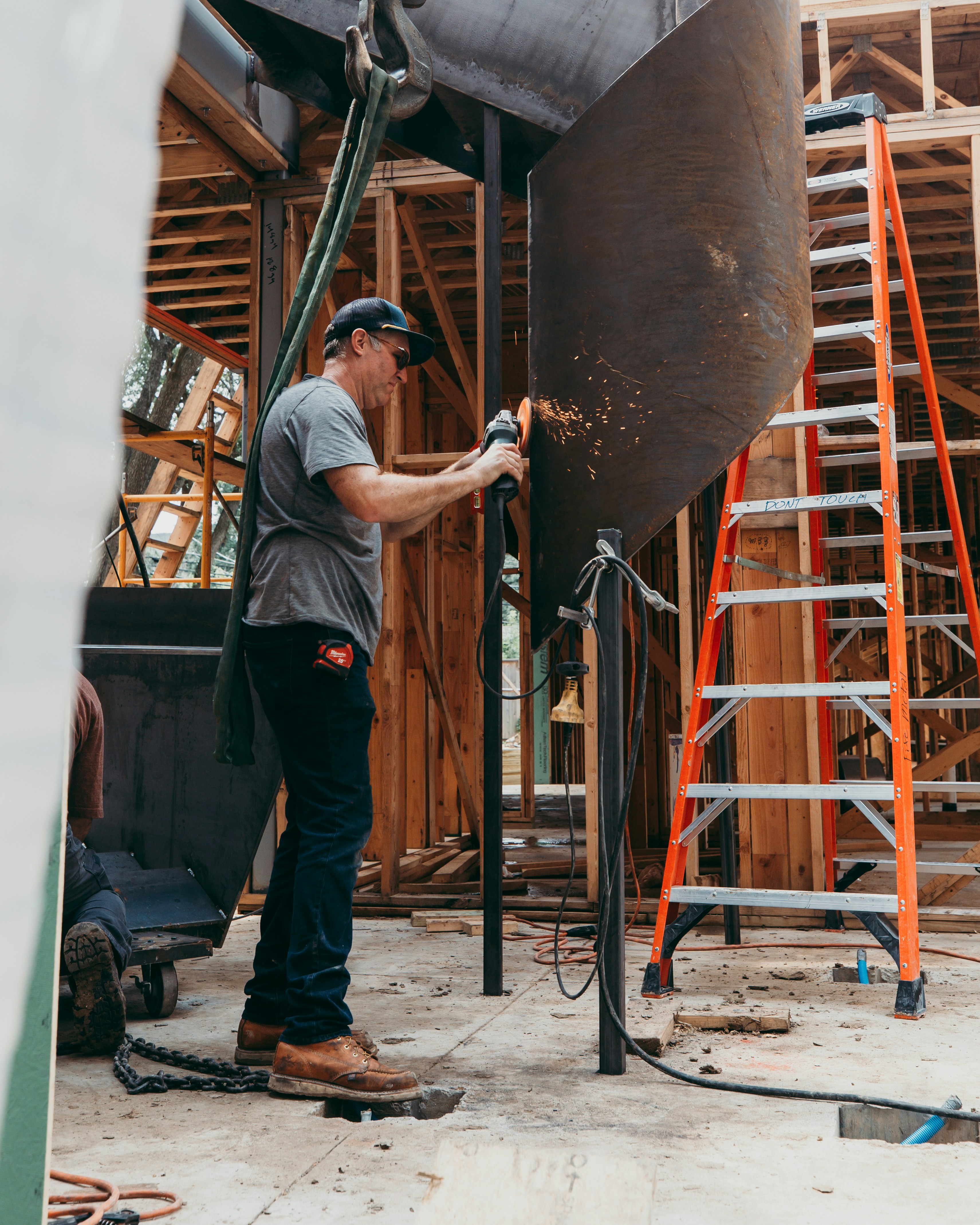 a man working on a large metal object