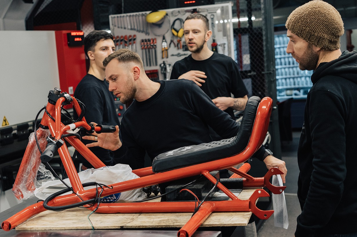 Engineer at a MakeIT Center hard tech incubator assembling a prototype