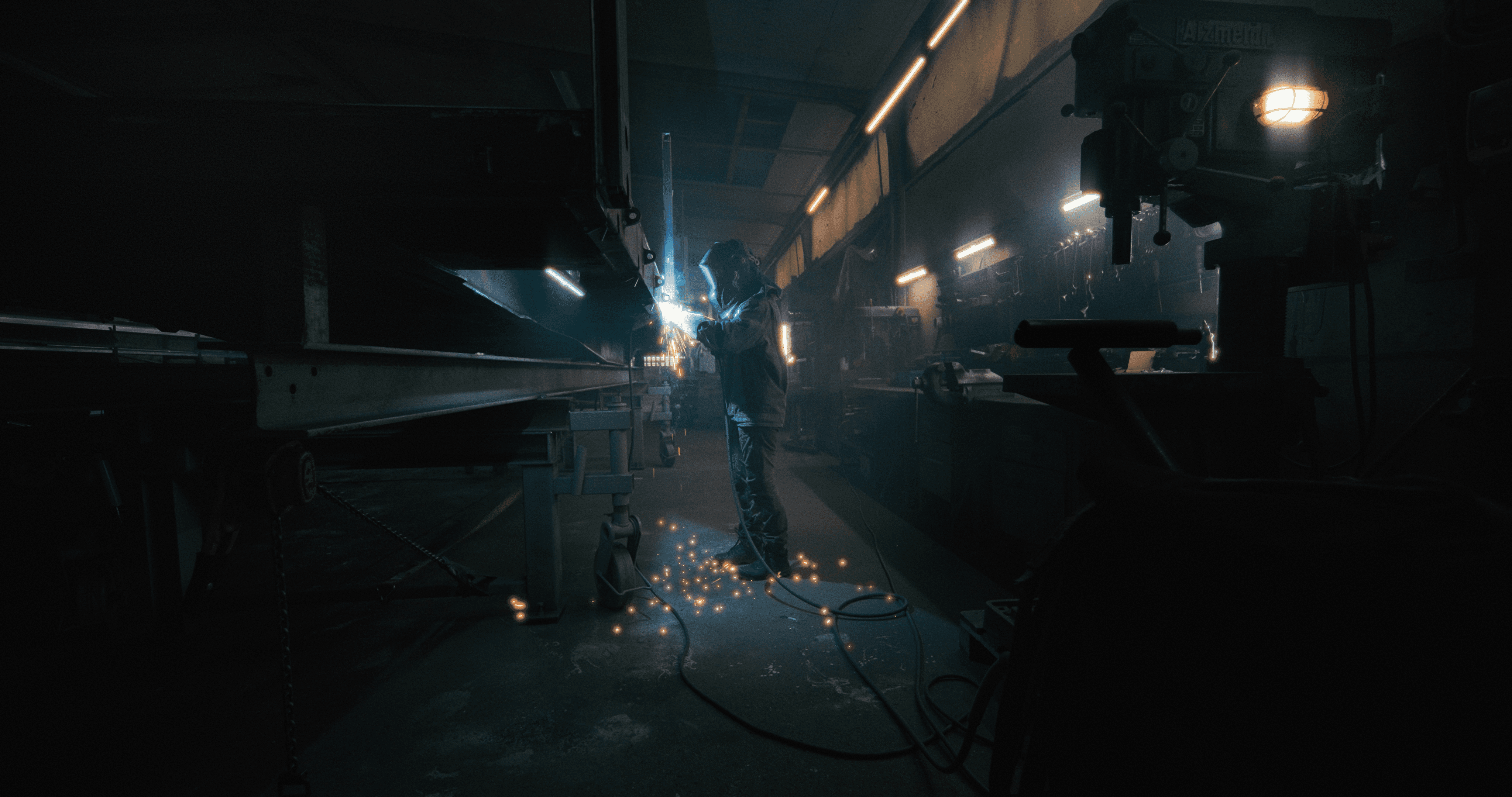 Streetside billboard with flyposters of the Batch.Works brand and illustrations