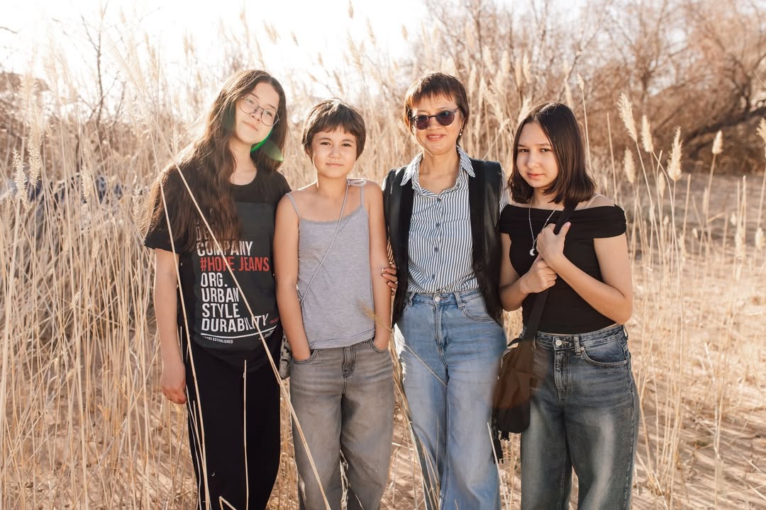husband and wife working happily on a laptop